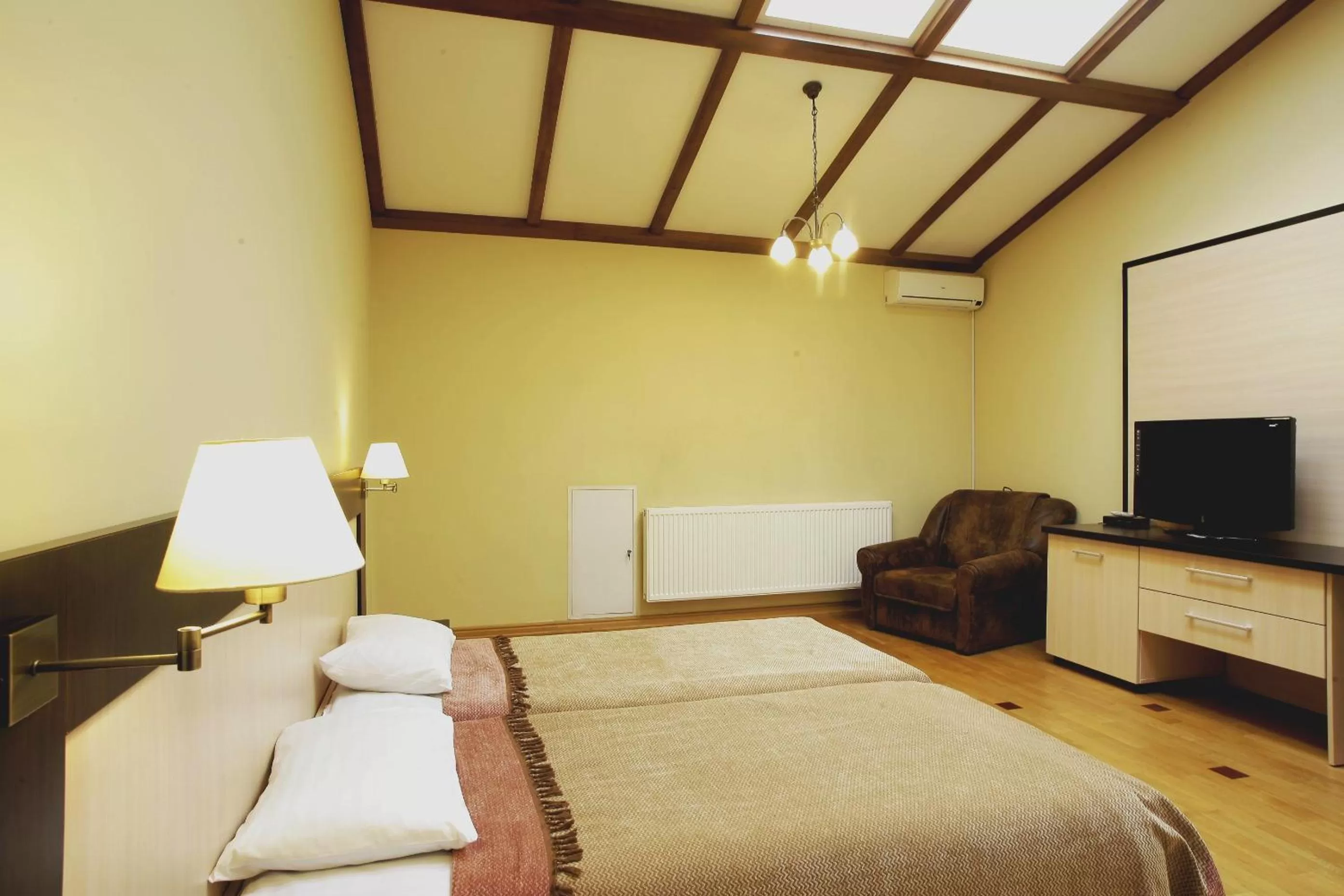 Bed in Mini-Hotel Under The Roof