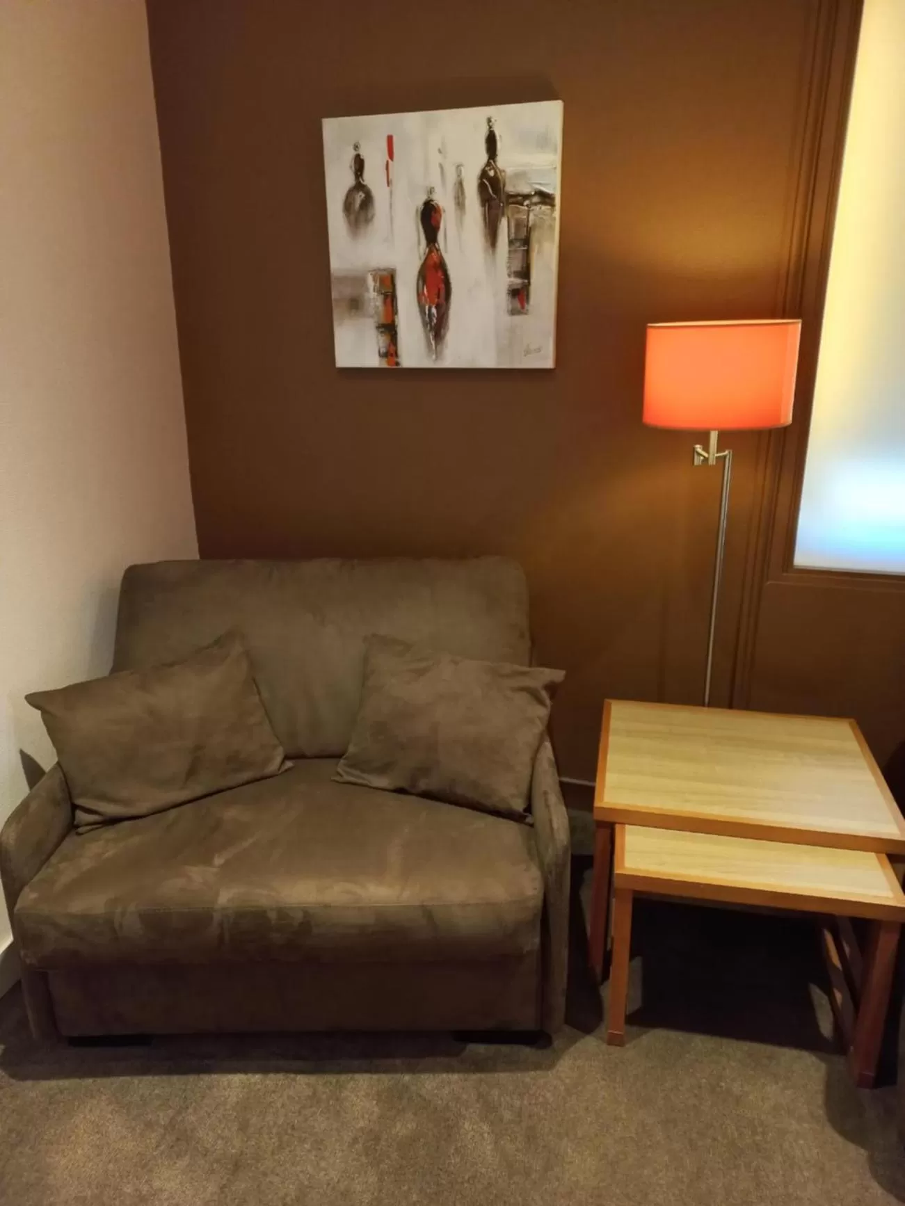 Seating area in Logis Hôtel La Résidence, Cognac Centre