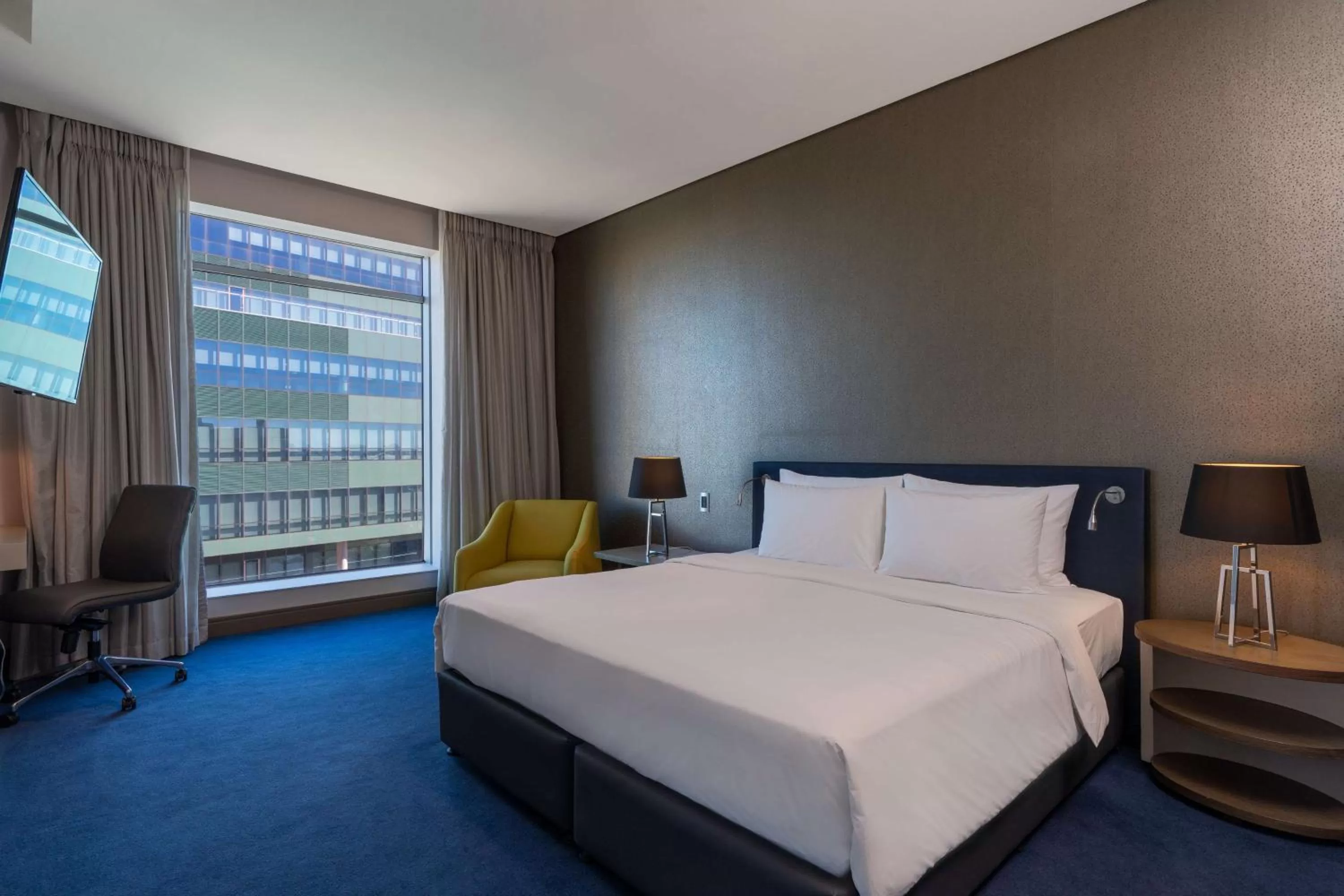 Photo of the whole room, Bed in Radisson Blu Gautrain Hotel, Sandton Johannesburg