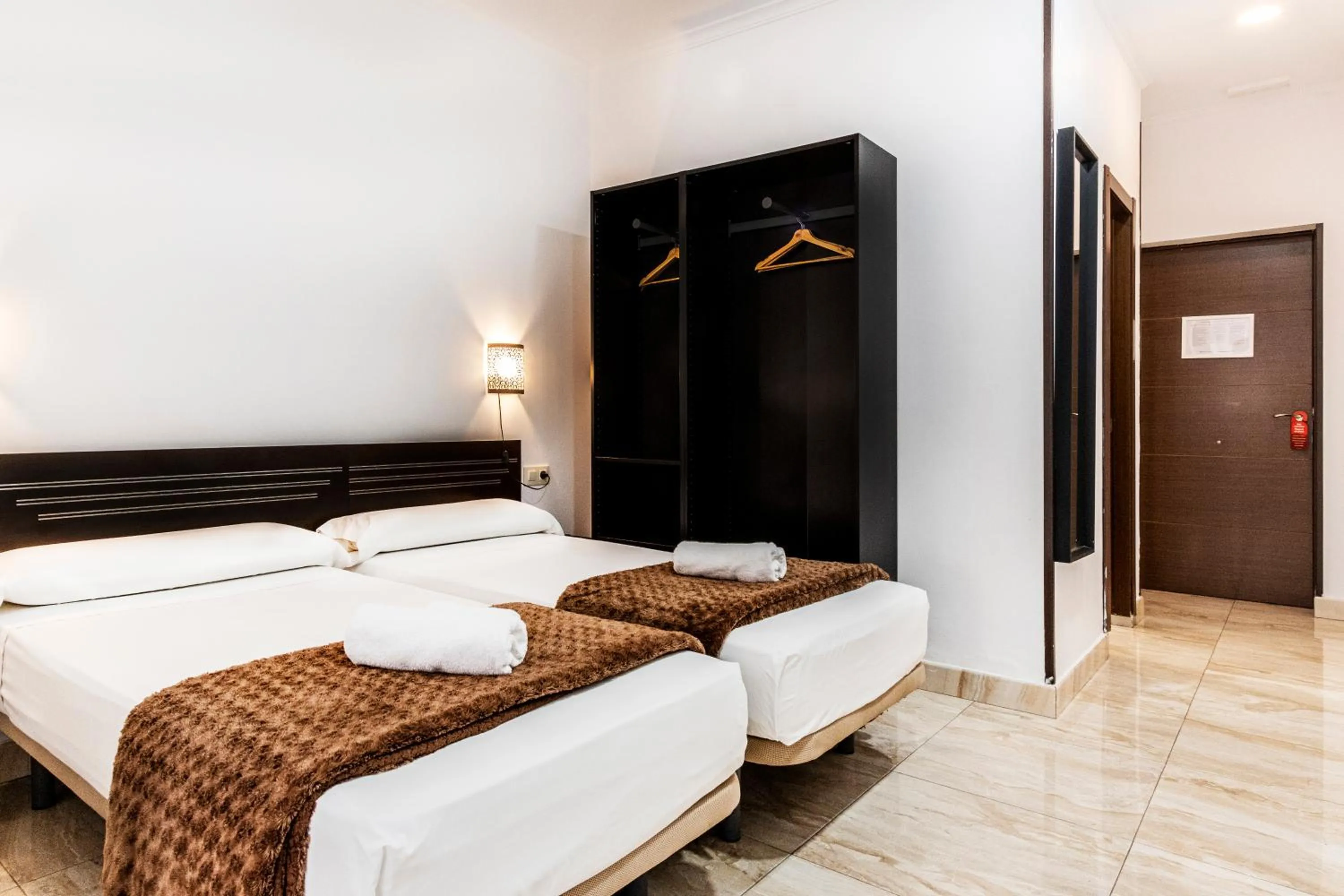 Photo of the whole room, Bed in Hostal Rincón de Sol - Centro Madrid - Self Checkin