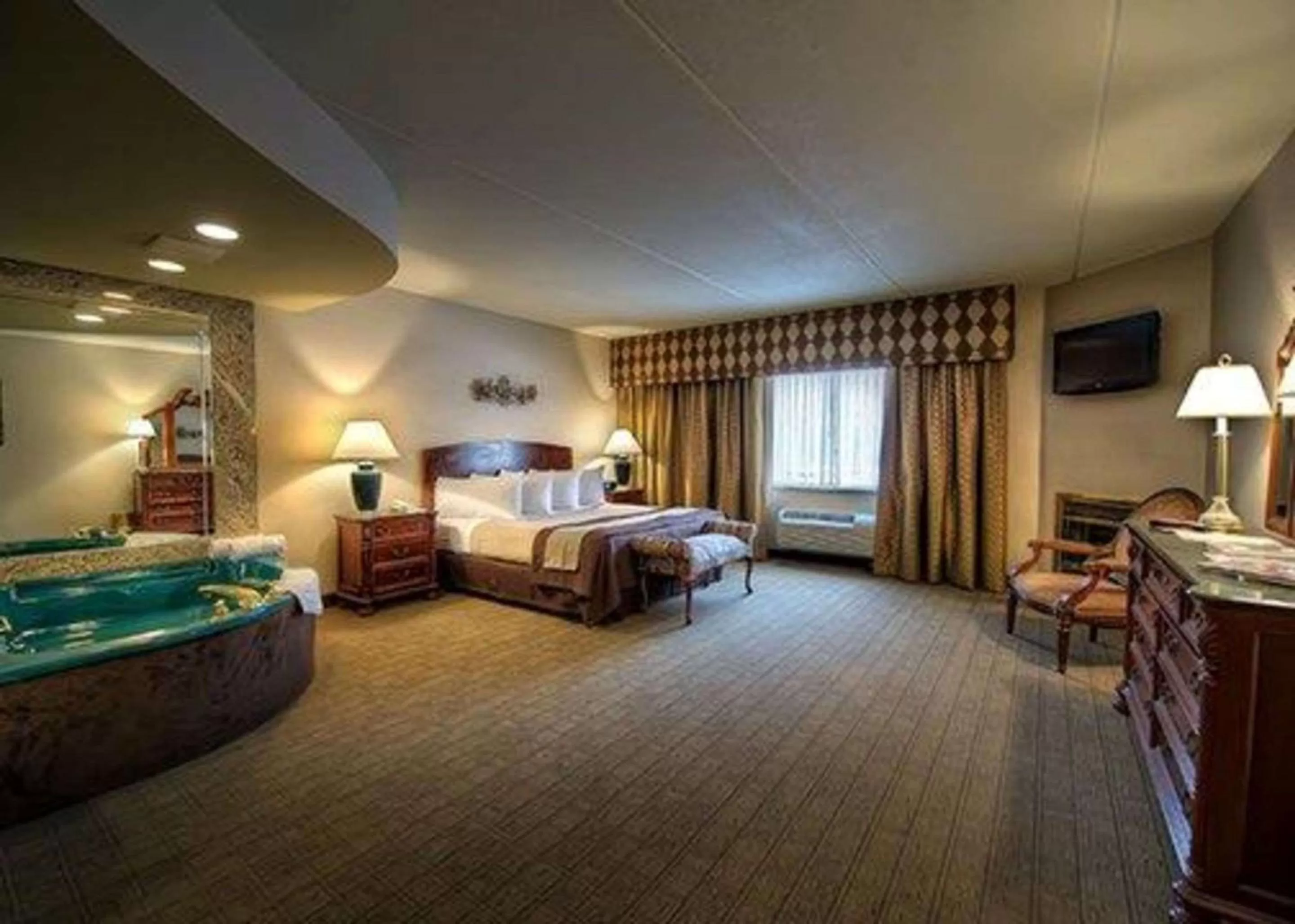 Photo of the whole room, Bed in Garden Place Hotel