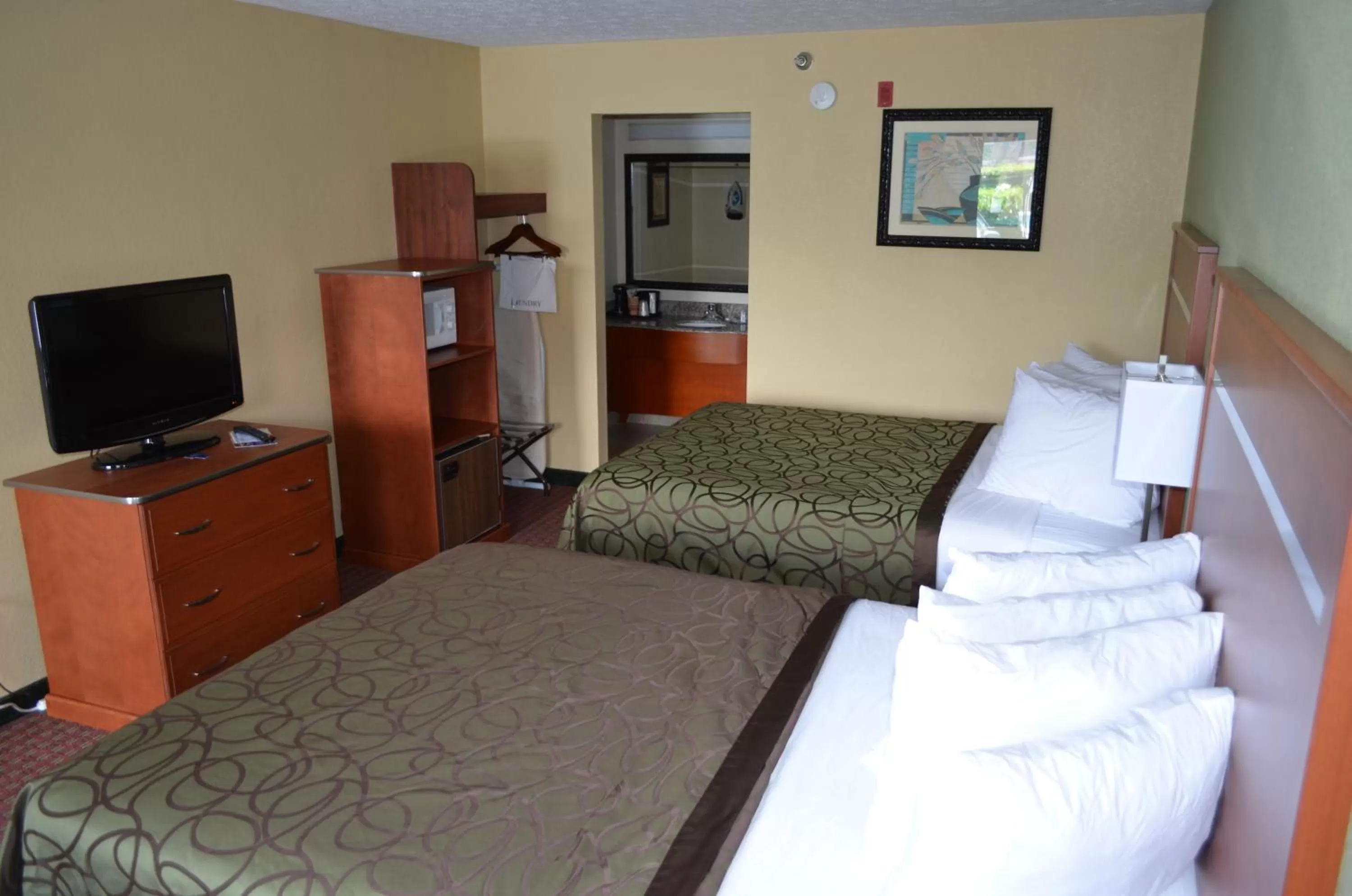 Photo of the whole room, Bed in Baymont by Wyndham Pigeon Forge near Island Drive