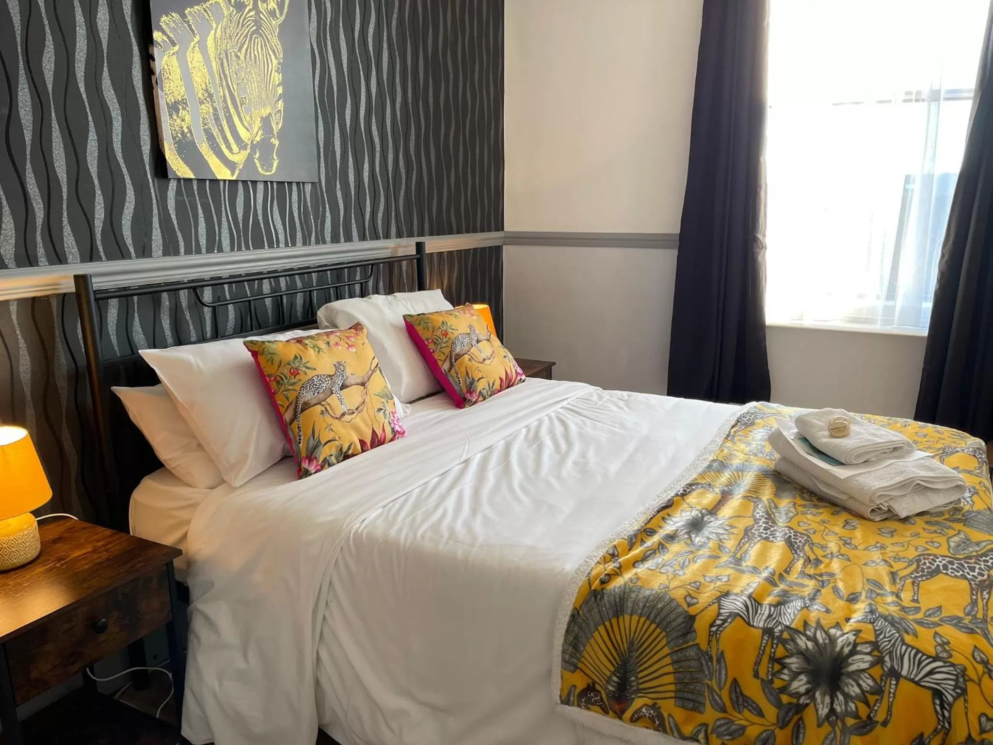 Bed in LilyRose Hotel