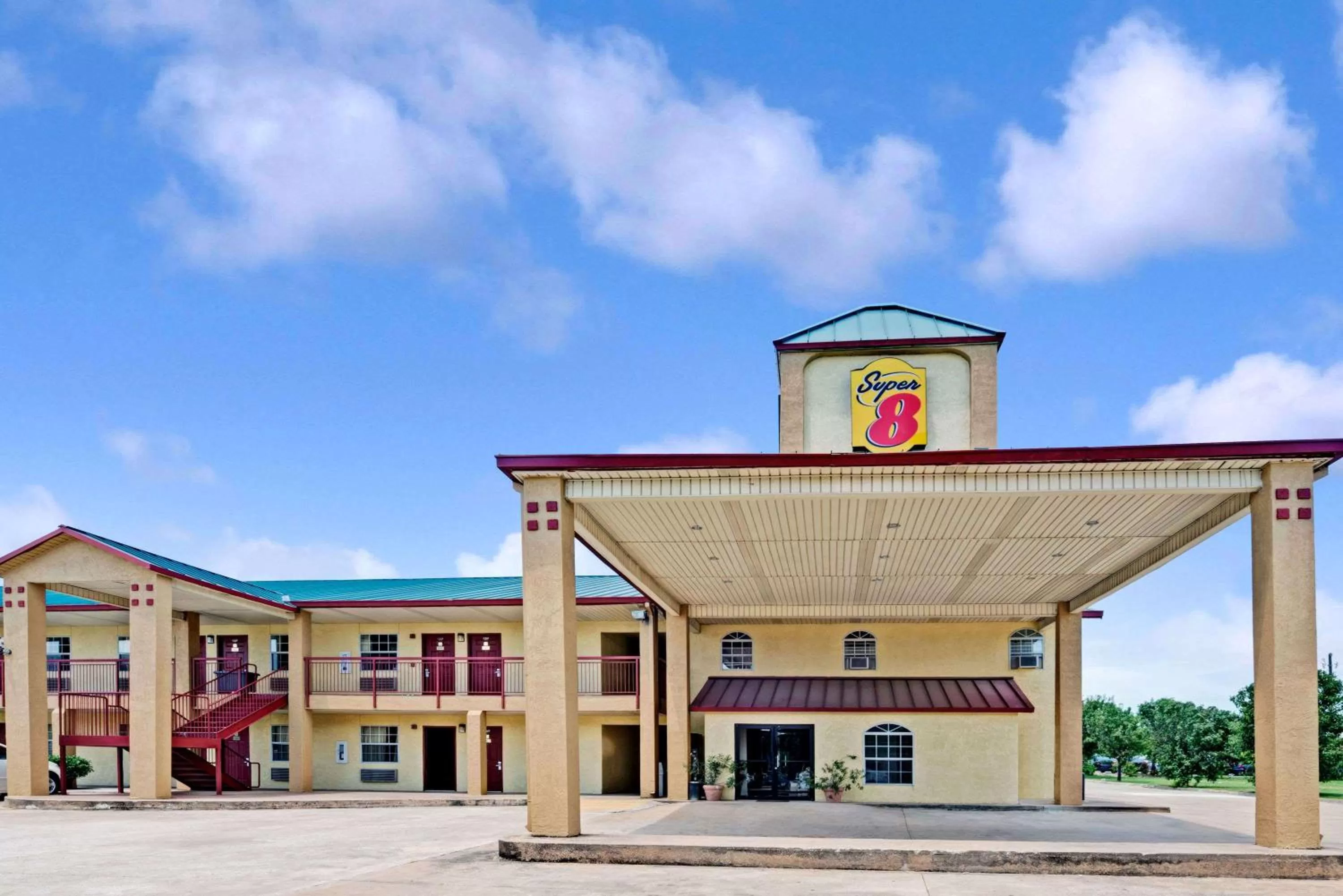 Property building in Super 8 by Wyndham Dallas South