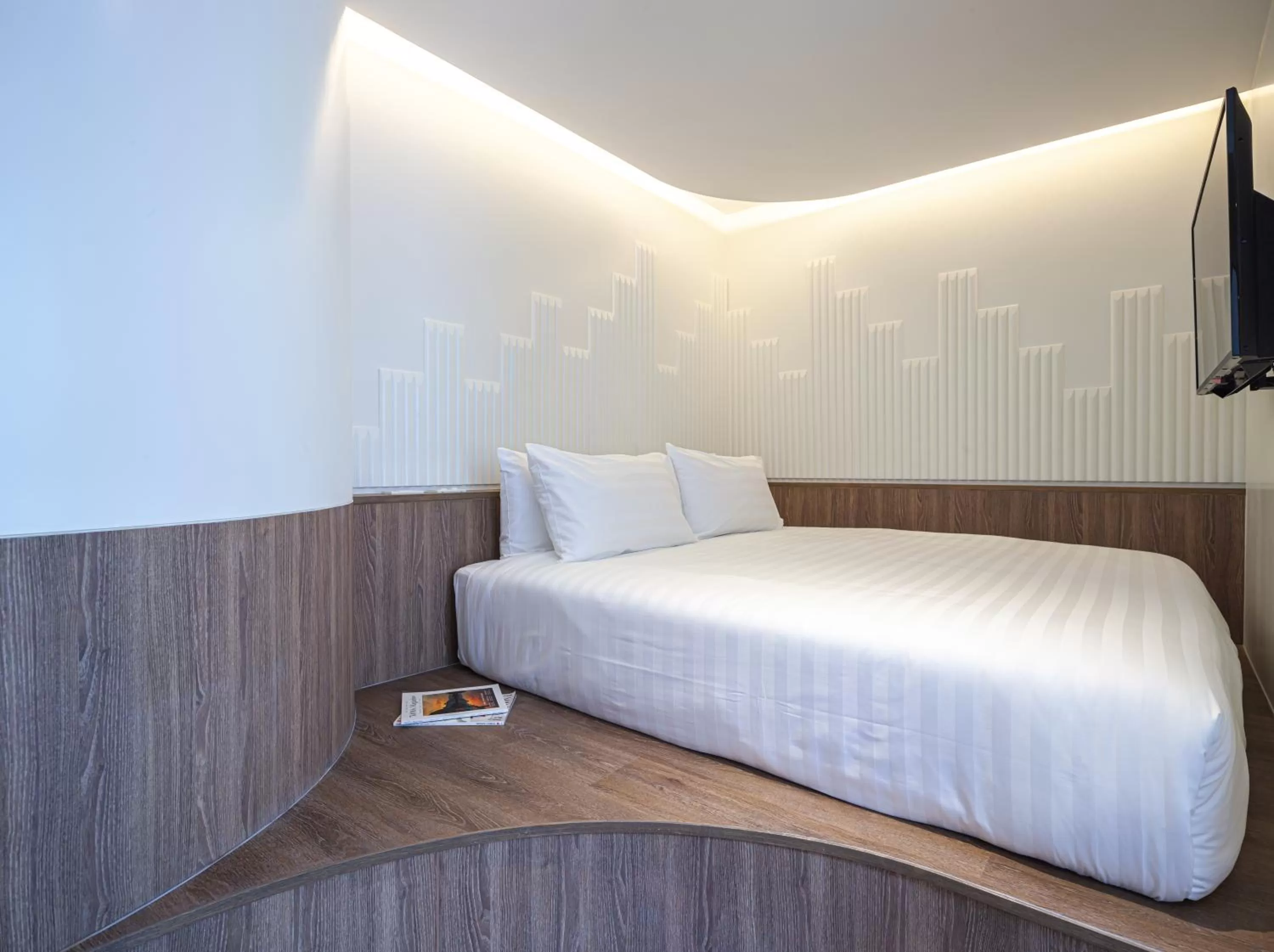 Bed in Bonsai Hotel Bangkok