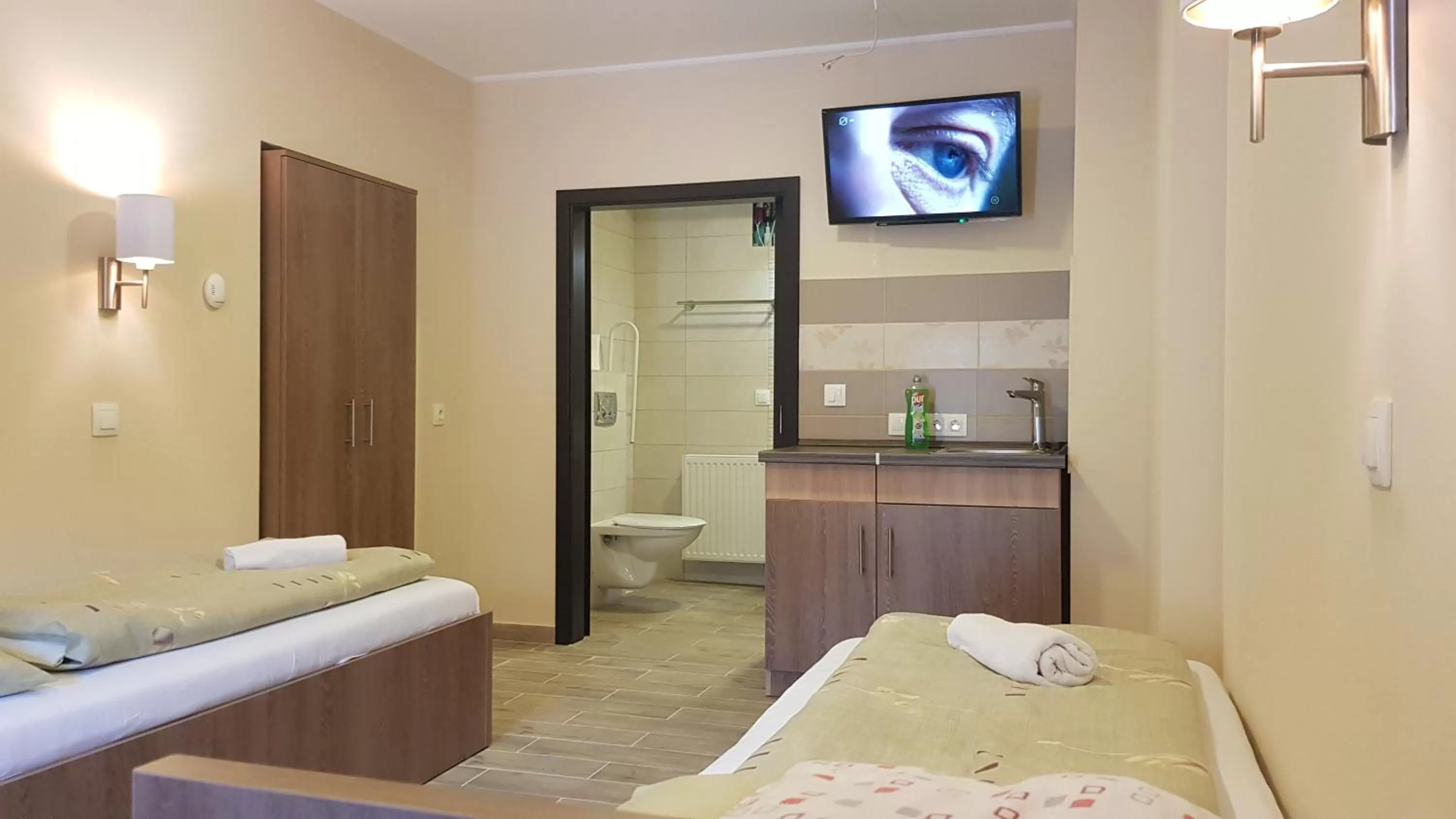 Bed in Central Panzió Gyula