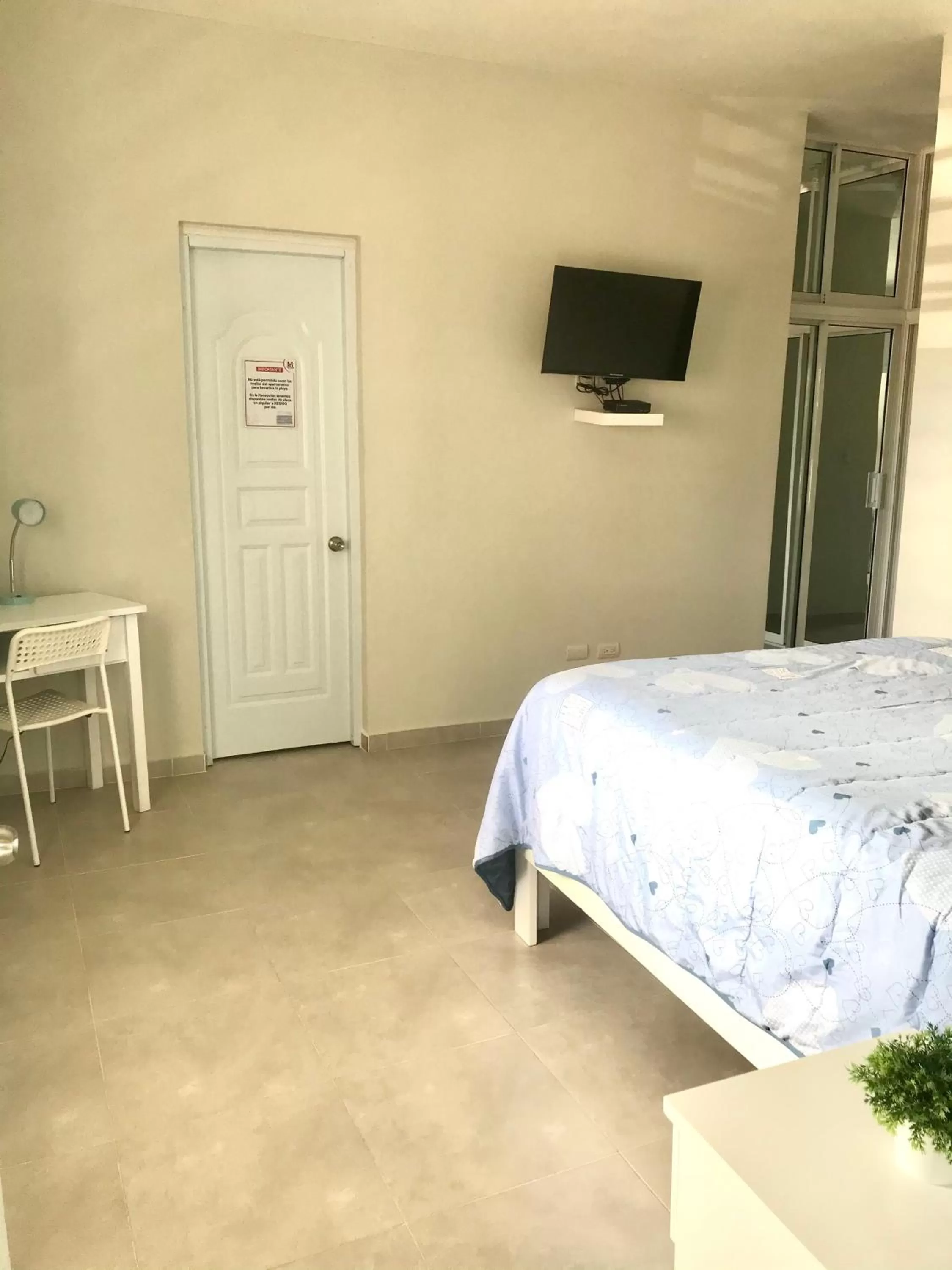 Bed in Apartahotel MACADANA