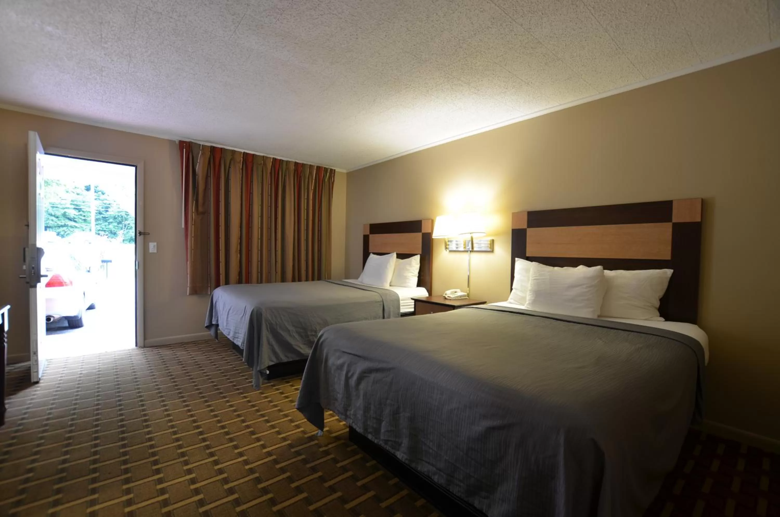 Bed in Travelowes Motel - Maggie Valley