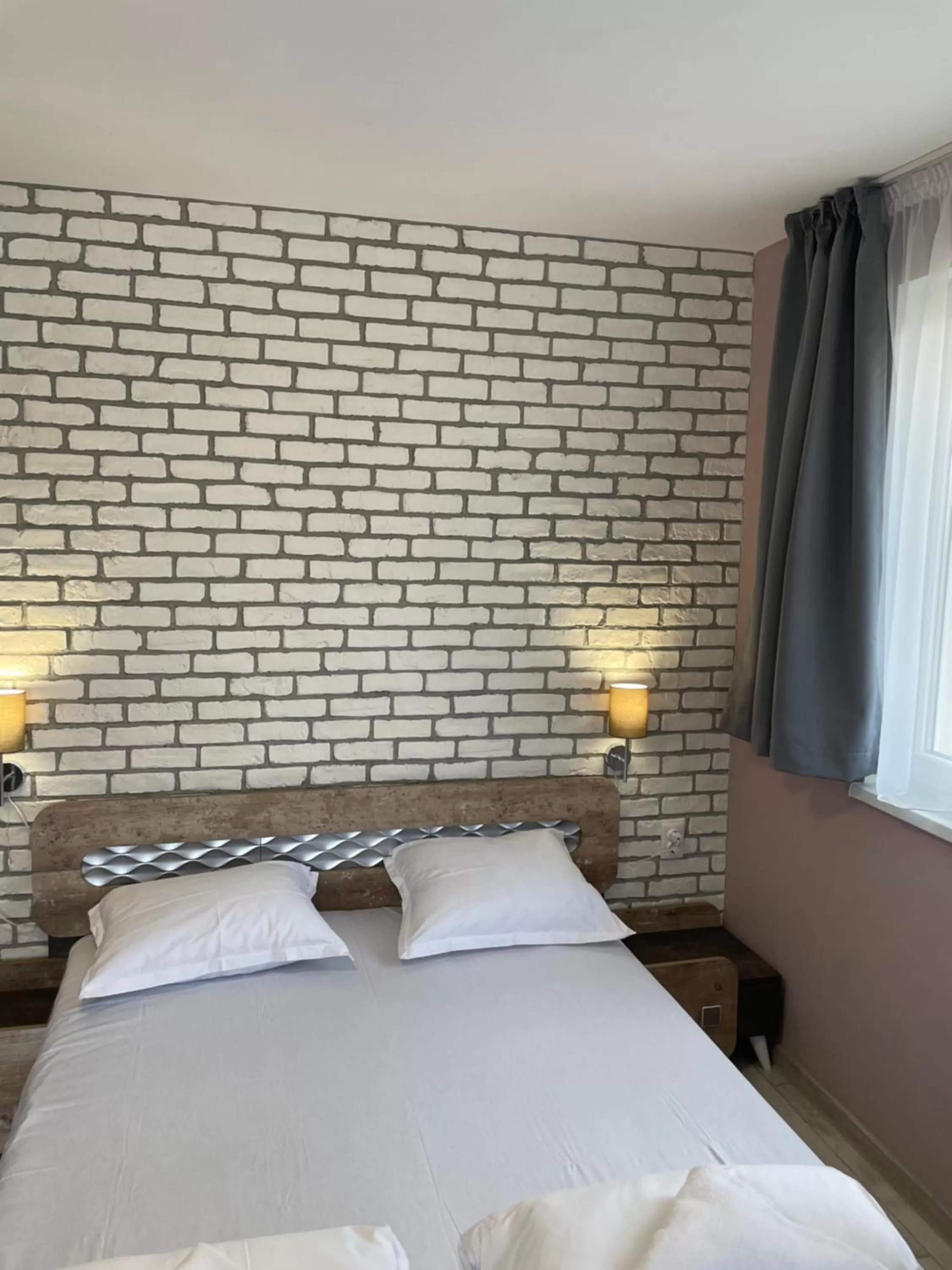 Bed in Family Hotel Malibu