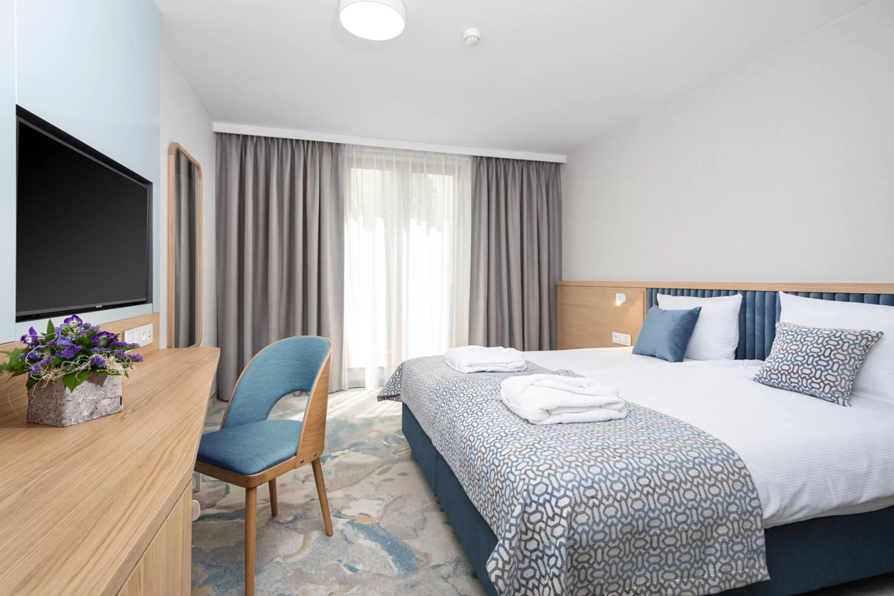 Bed in Maloves Resort & Spa