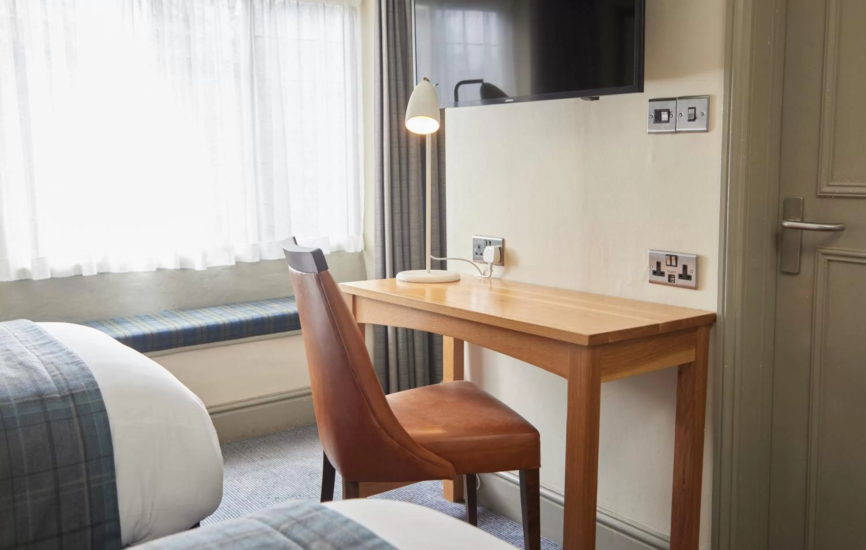 Seating area in Red Lion Hotel by Greene King Inns