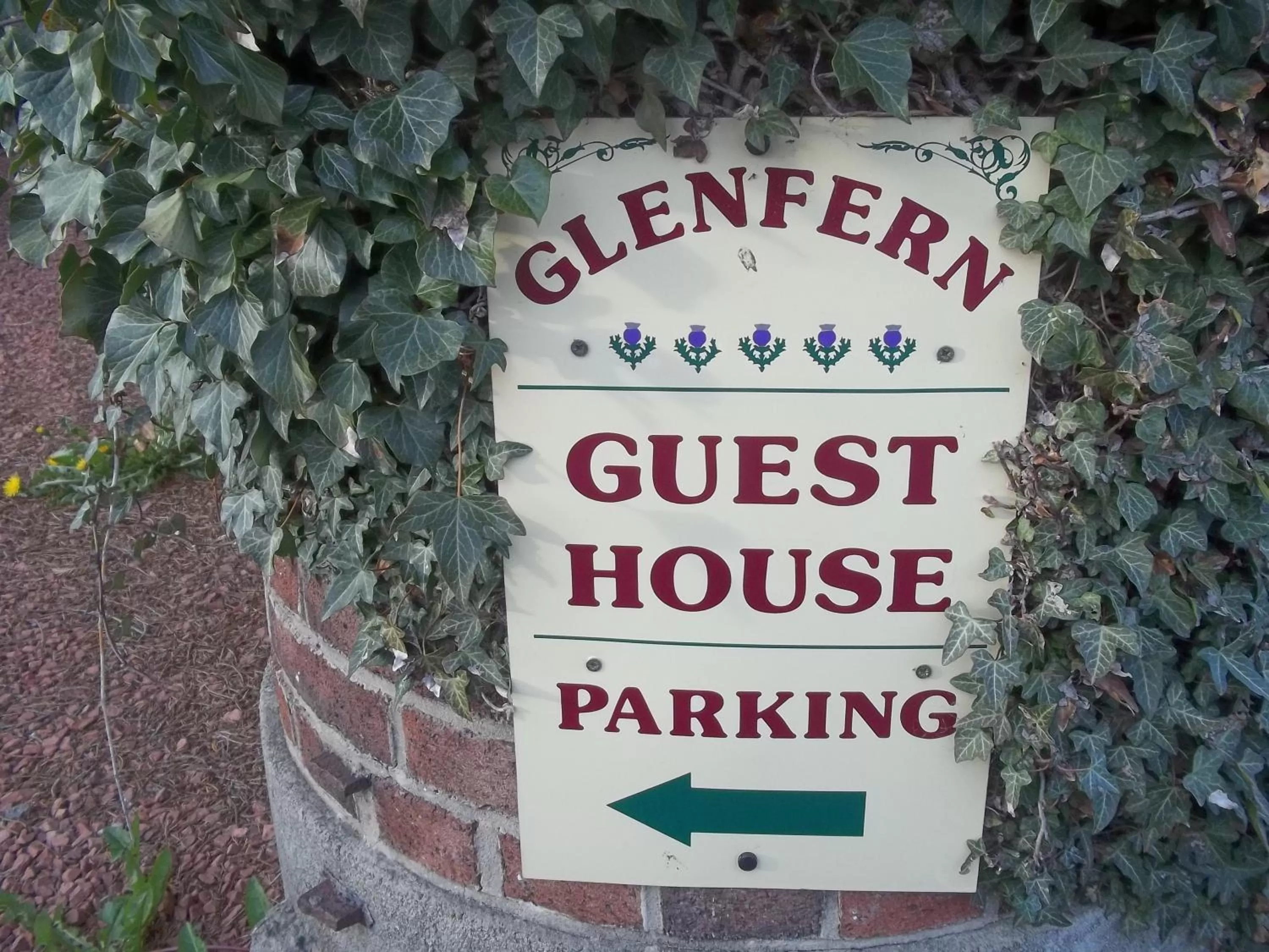 Property logo or sign in Glenfern Guest House and a separate Cottage with its own private hot tub