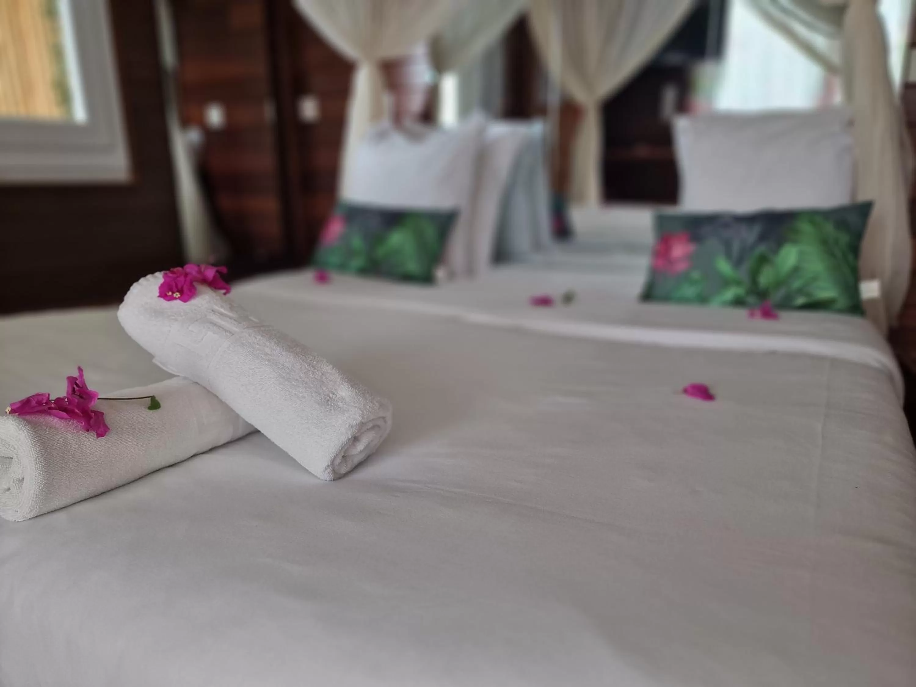 Bed in Hotel Le Manguier