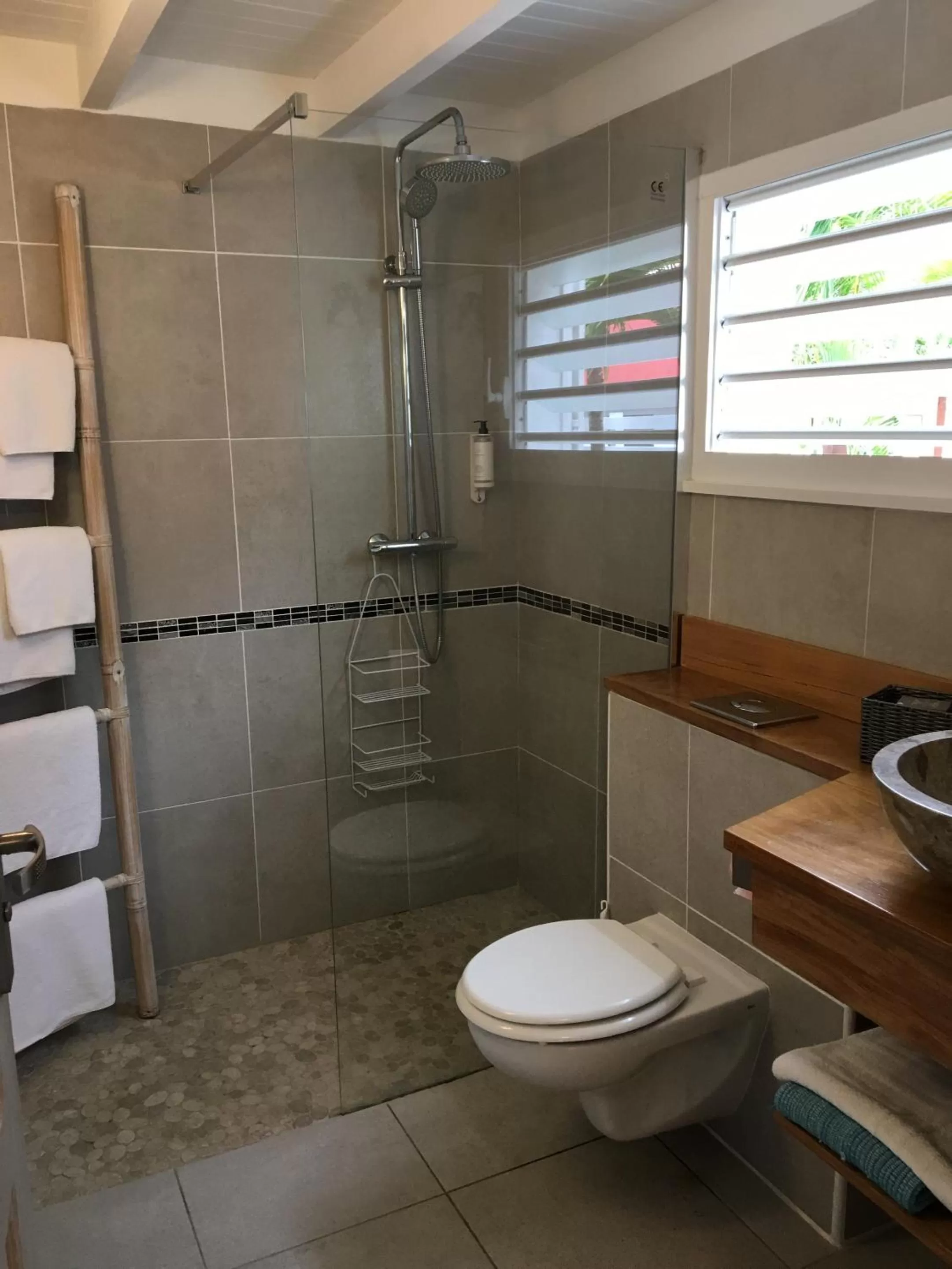 Bathroom in Chambres d'hôtes et villas chez Flo