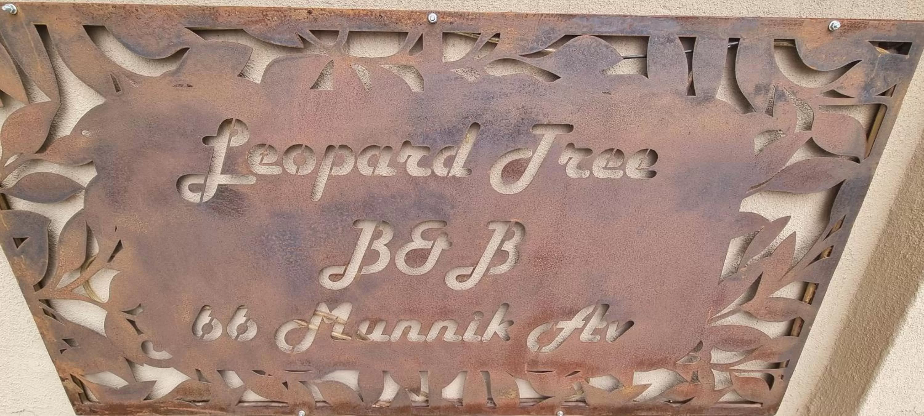 Property logo or sign in The Leopard Tree