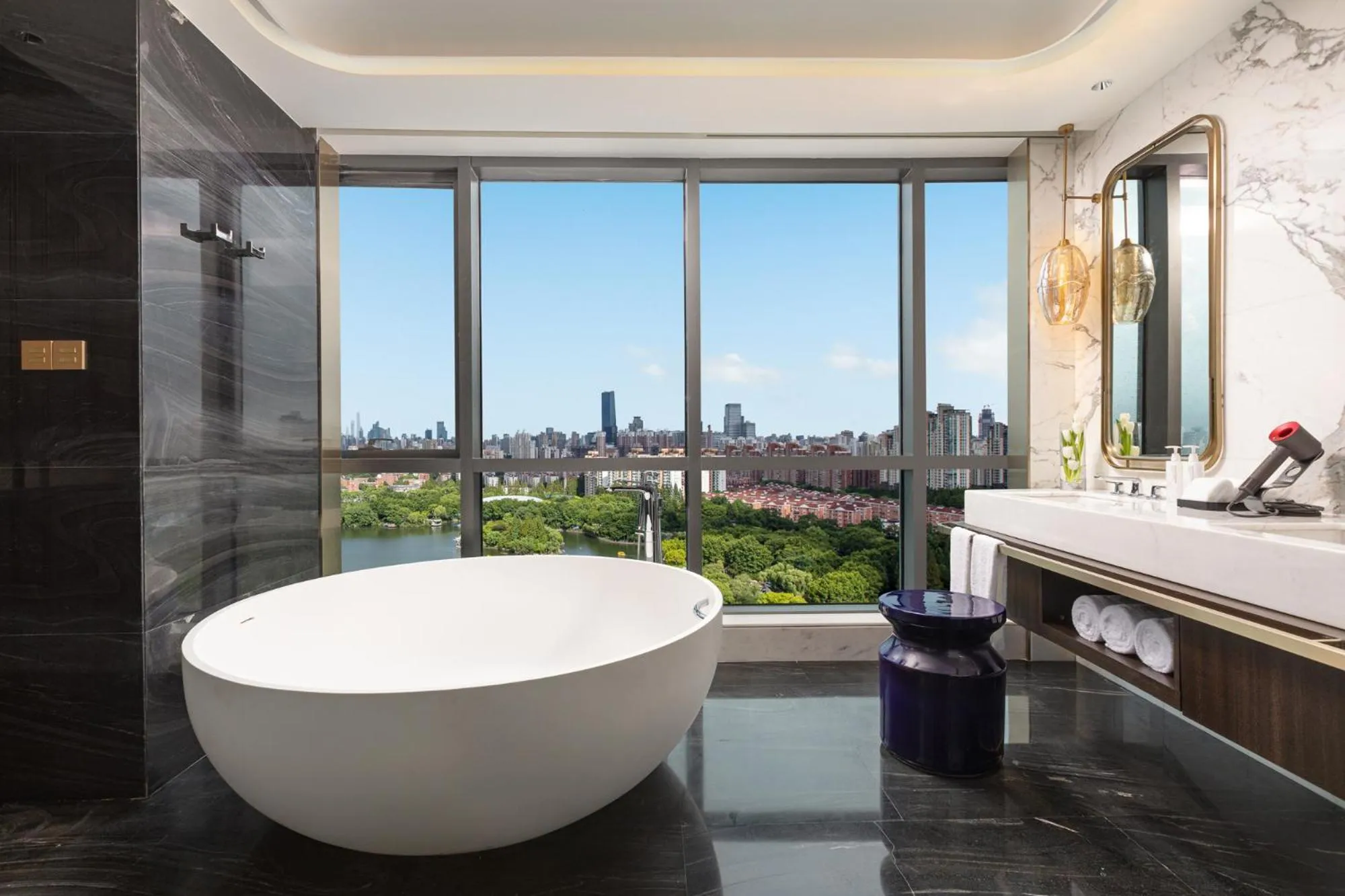 Bathroom in HUALUXE Shanghai Changfeng Park by IHG