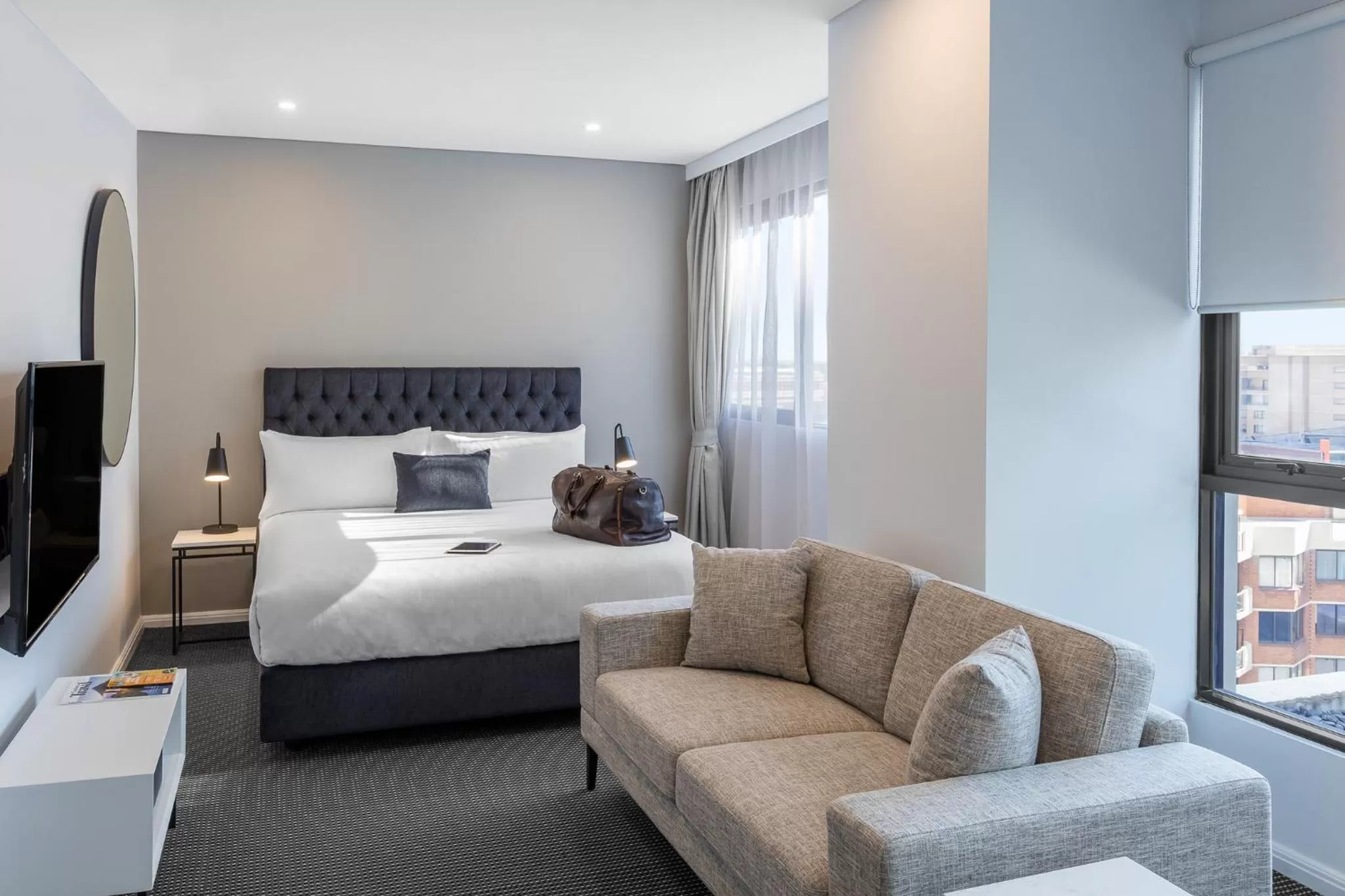 Bed in Meriton Suites Kent Street, Sydney