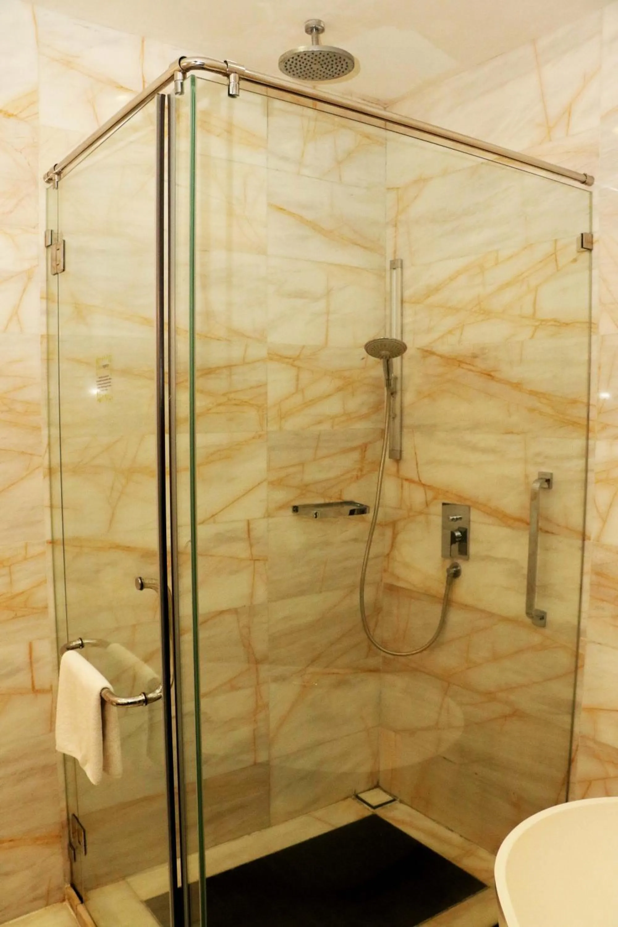 Shower in Pacific Regency Hotel Suites