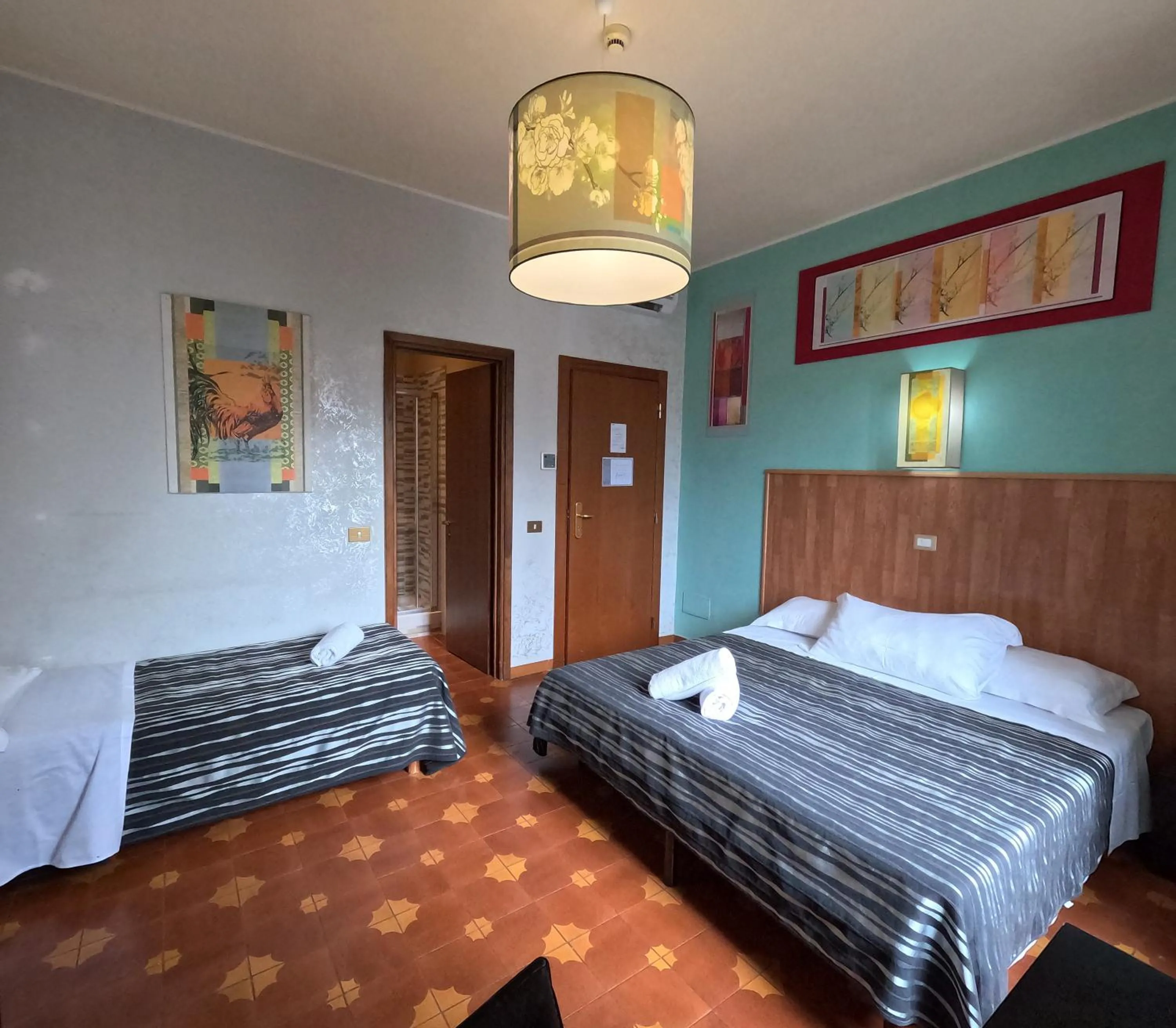 Bed in Roma Room Hotel