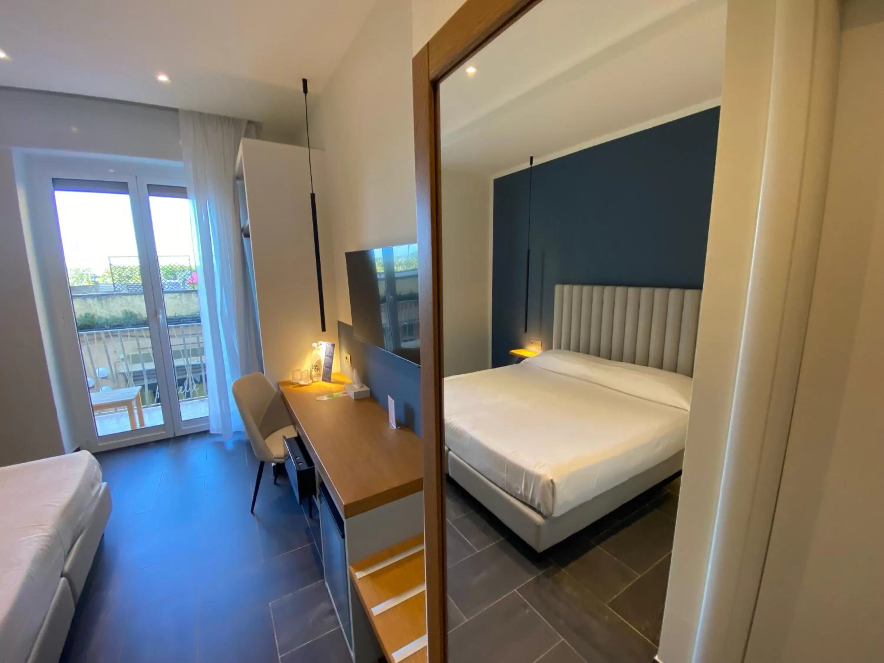 Balcony/Terrace, Bed in Hotel Garden