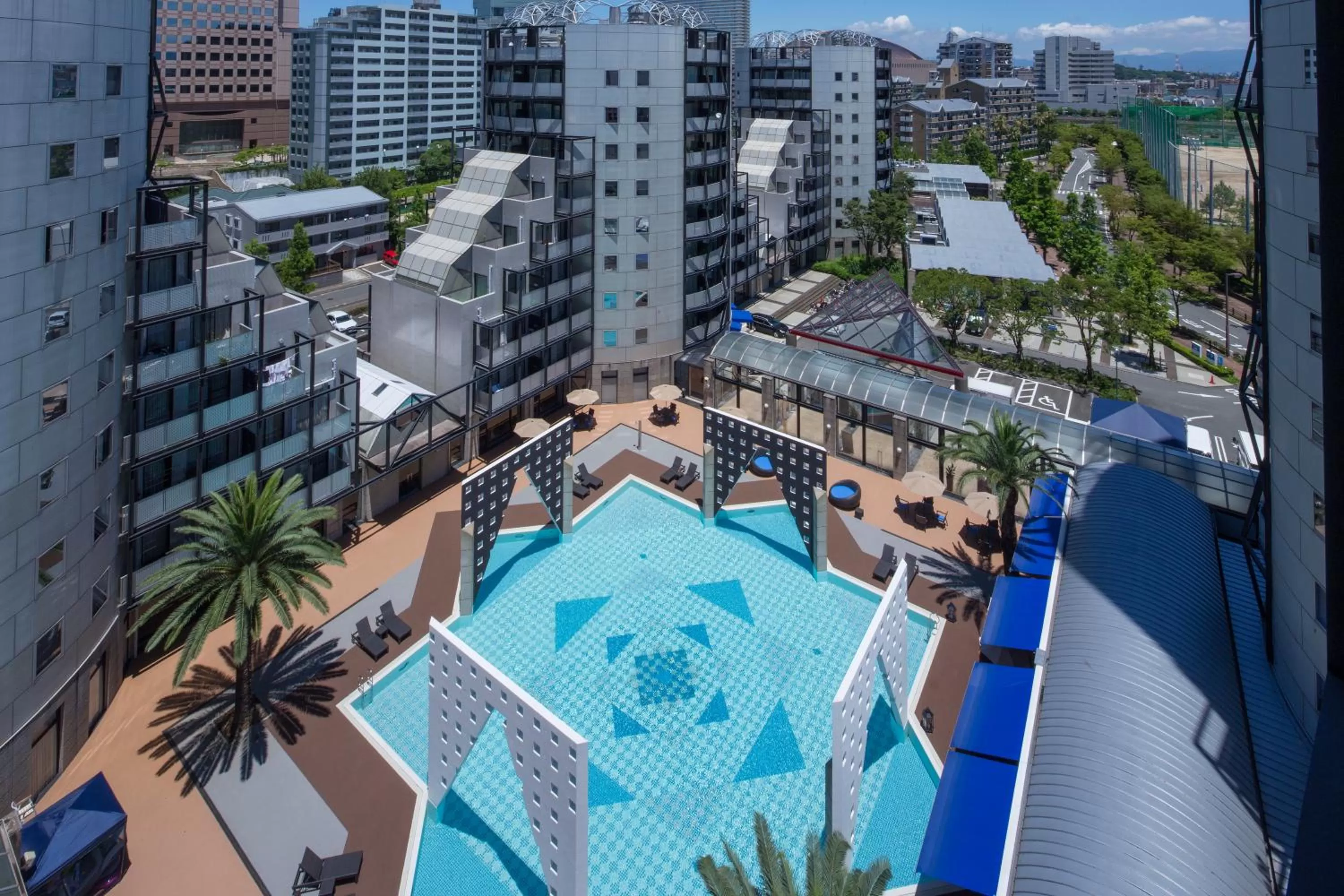 Swimming pool in The Residential Suites Fukuoka