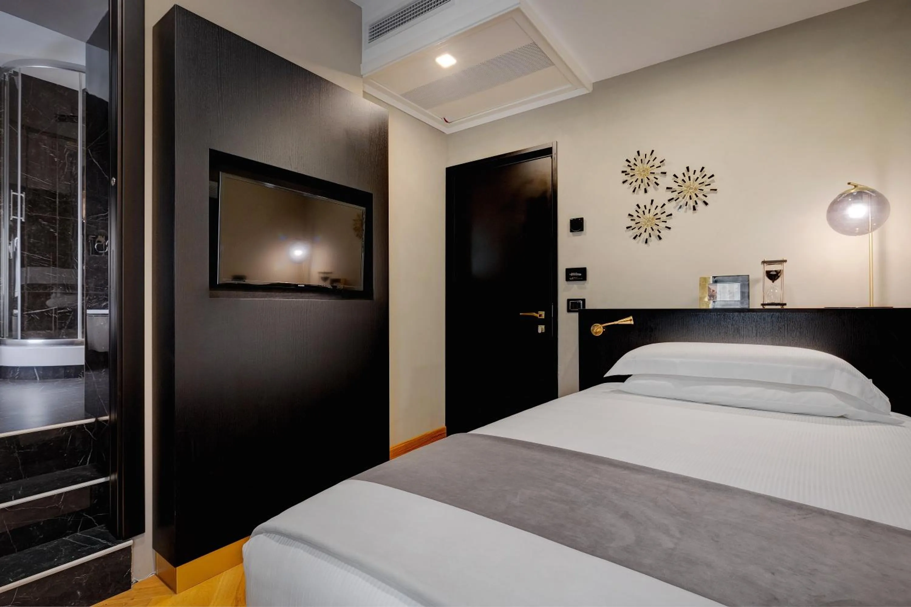 Photo of the whole room, Bed in Dharma Boutique Hotel & SPA