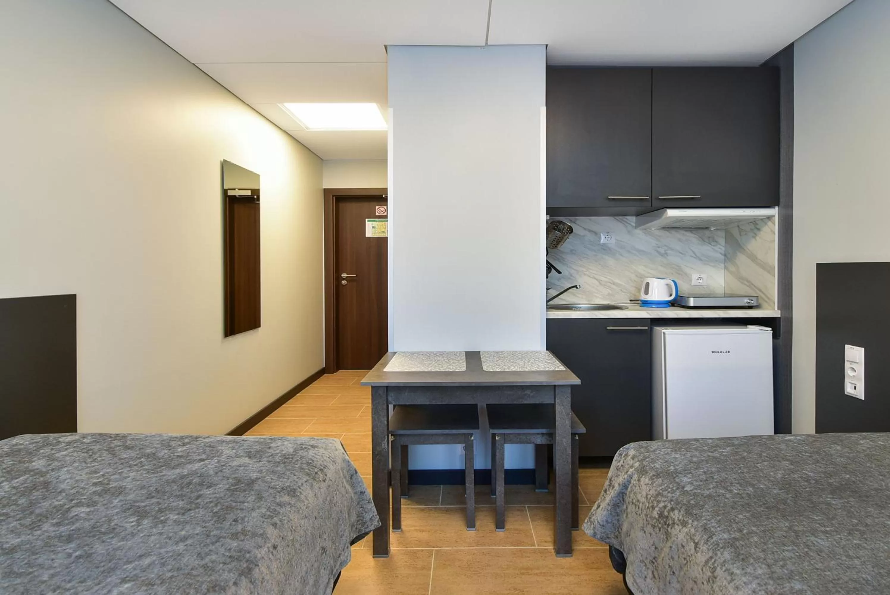 Bed in City Yard Inn Hotel