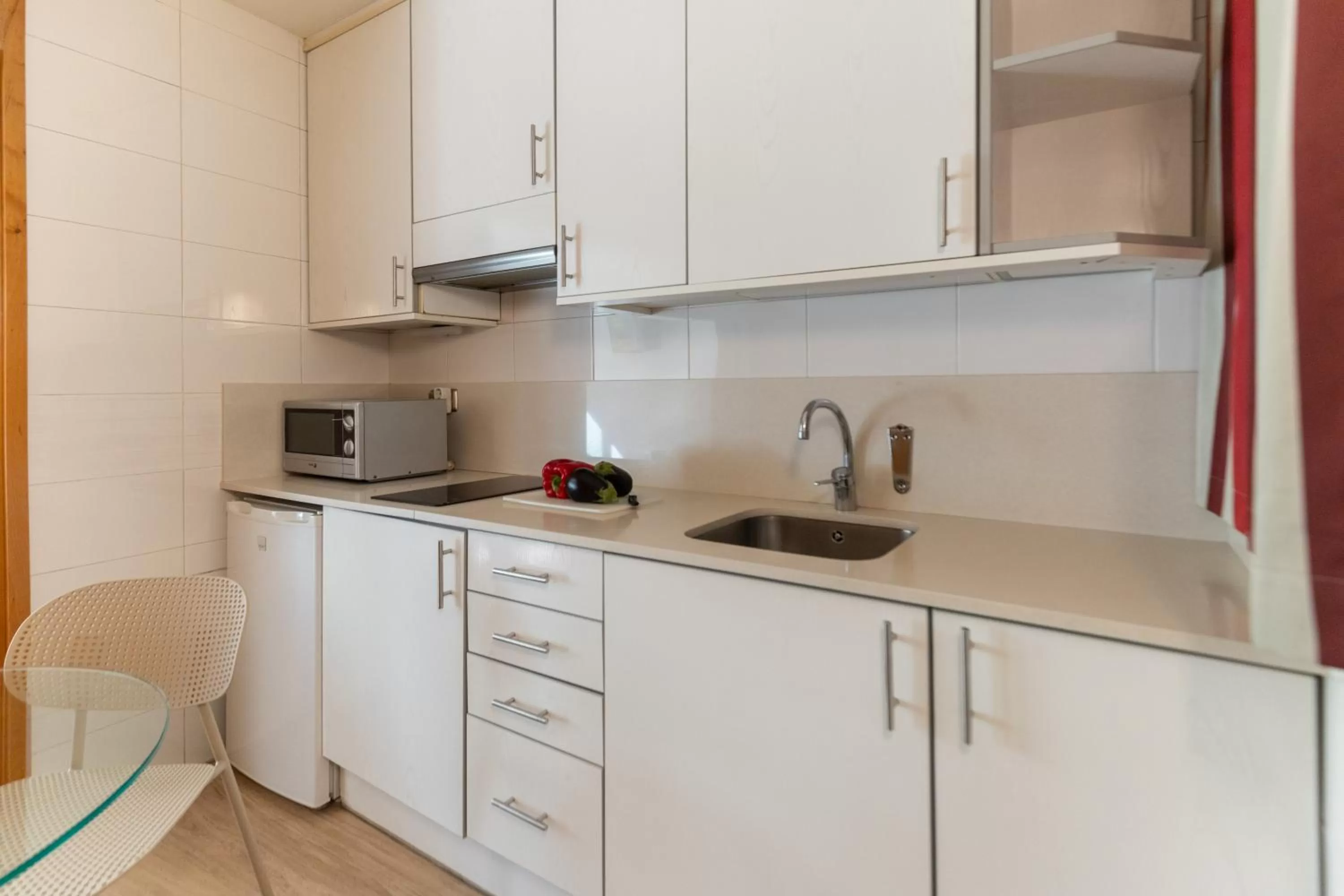 Kitchen or kitchenette in Atica Apartments - by Weflating