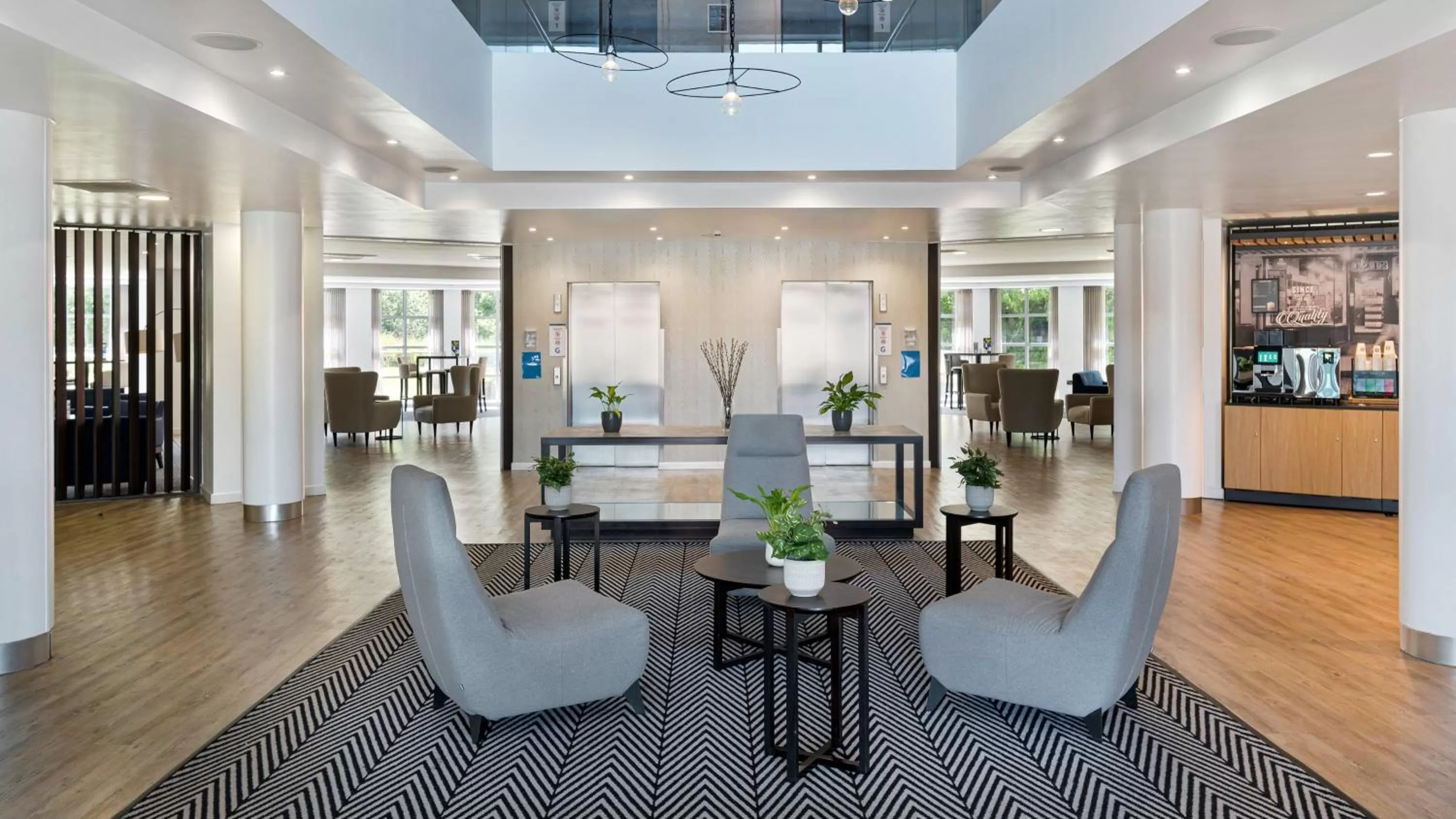 Lobby or reception in Holiday Inn Express Leigh - Sports Village by IHG