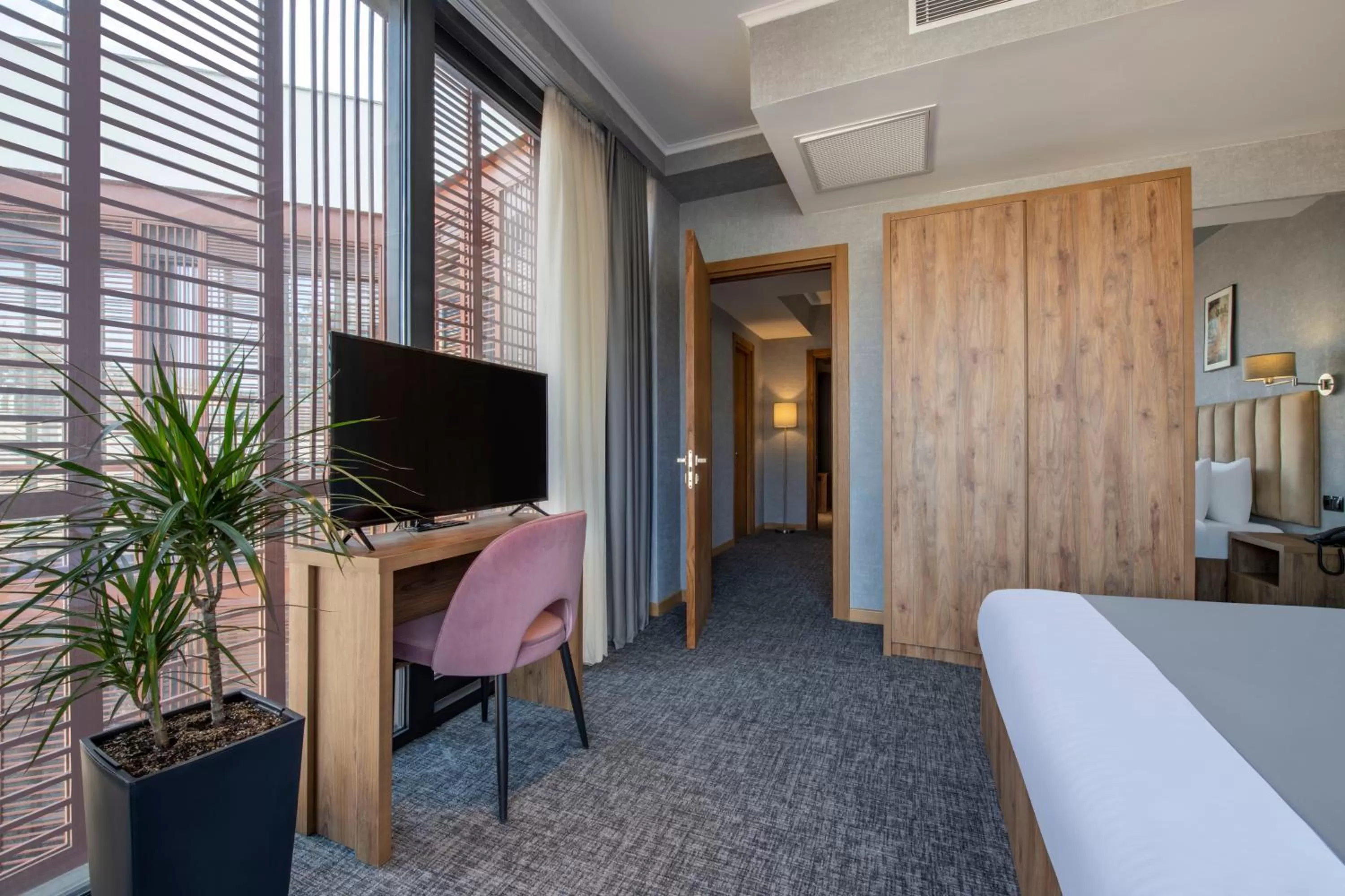 Communal lounge/ TV room, Bed in Barnovi Boutique Hotel