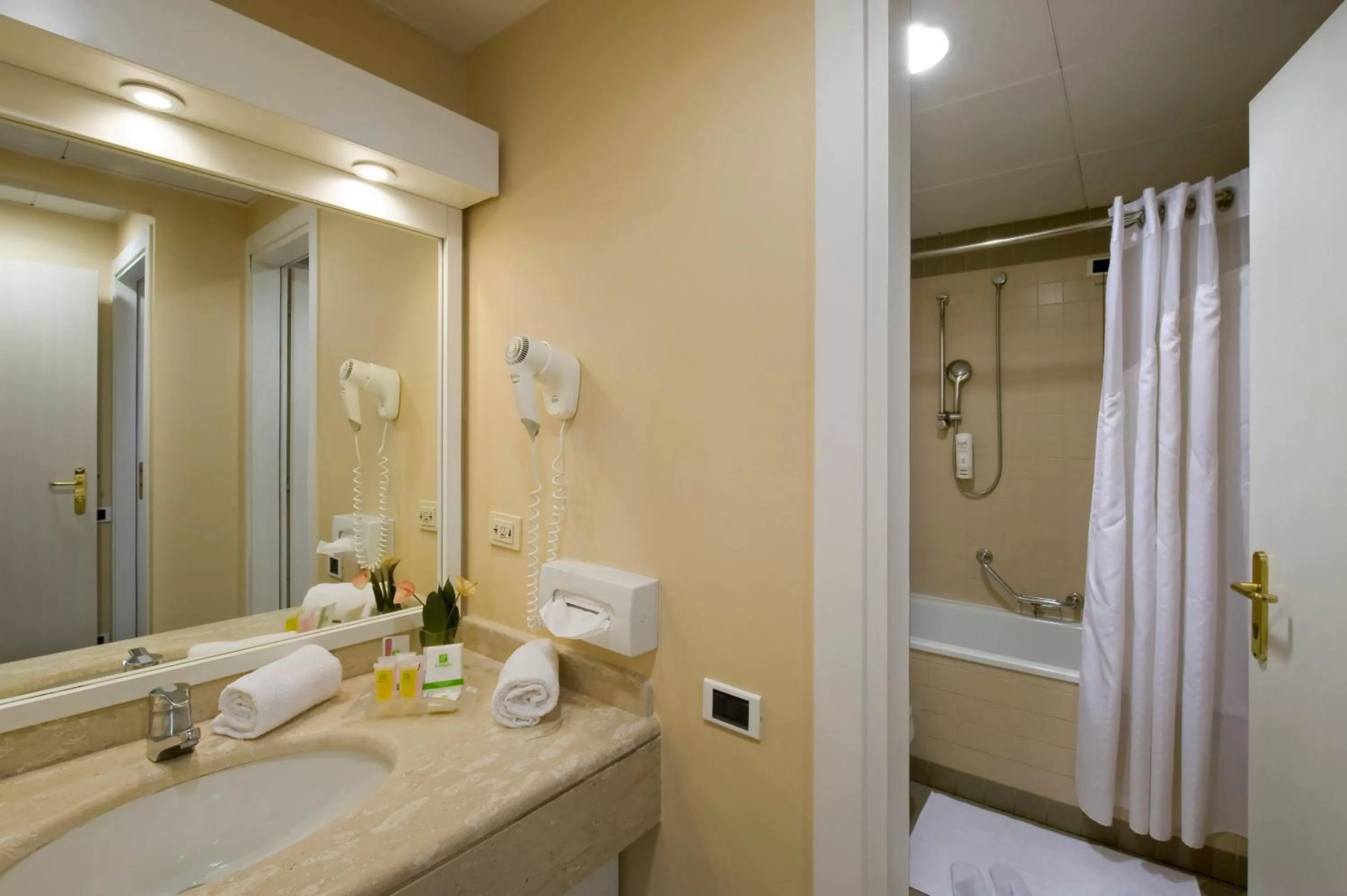 Bathroom in Holiday Inn Naples by IHG