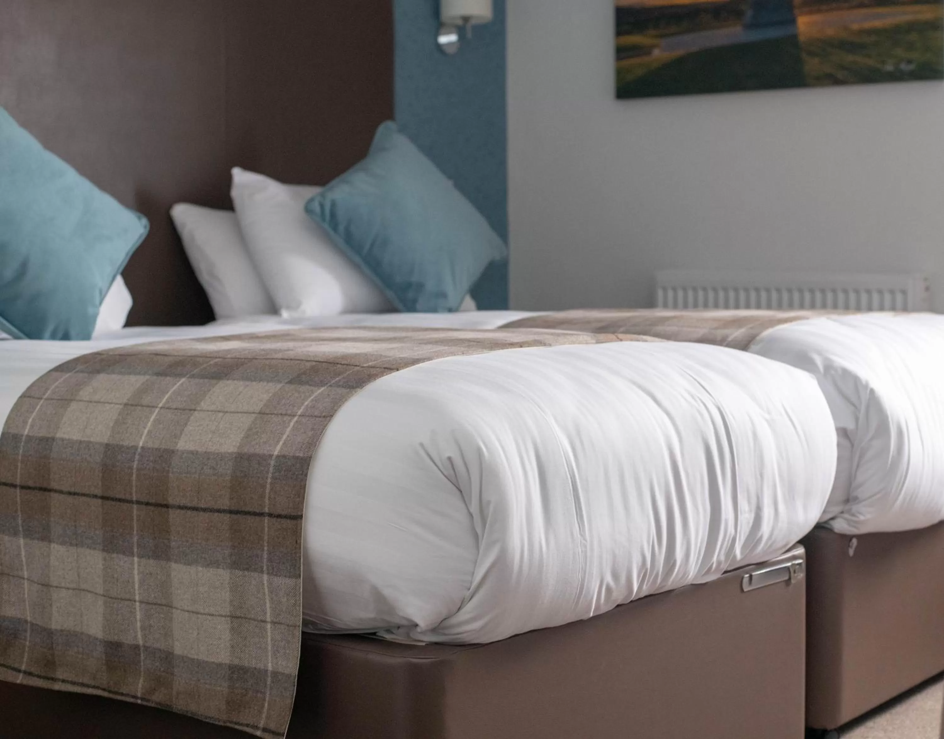 Bed in King Robert Hotel