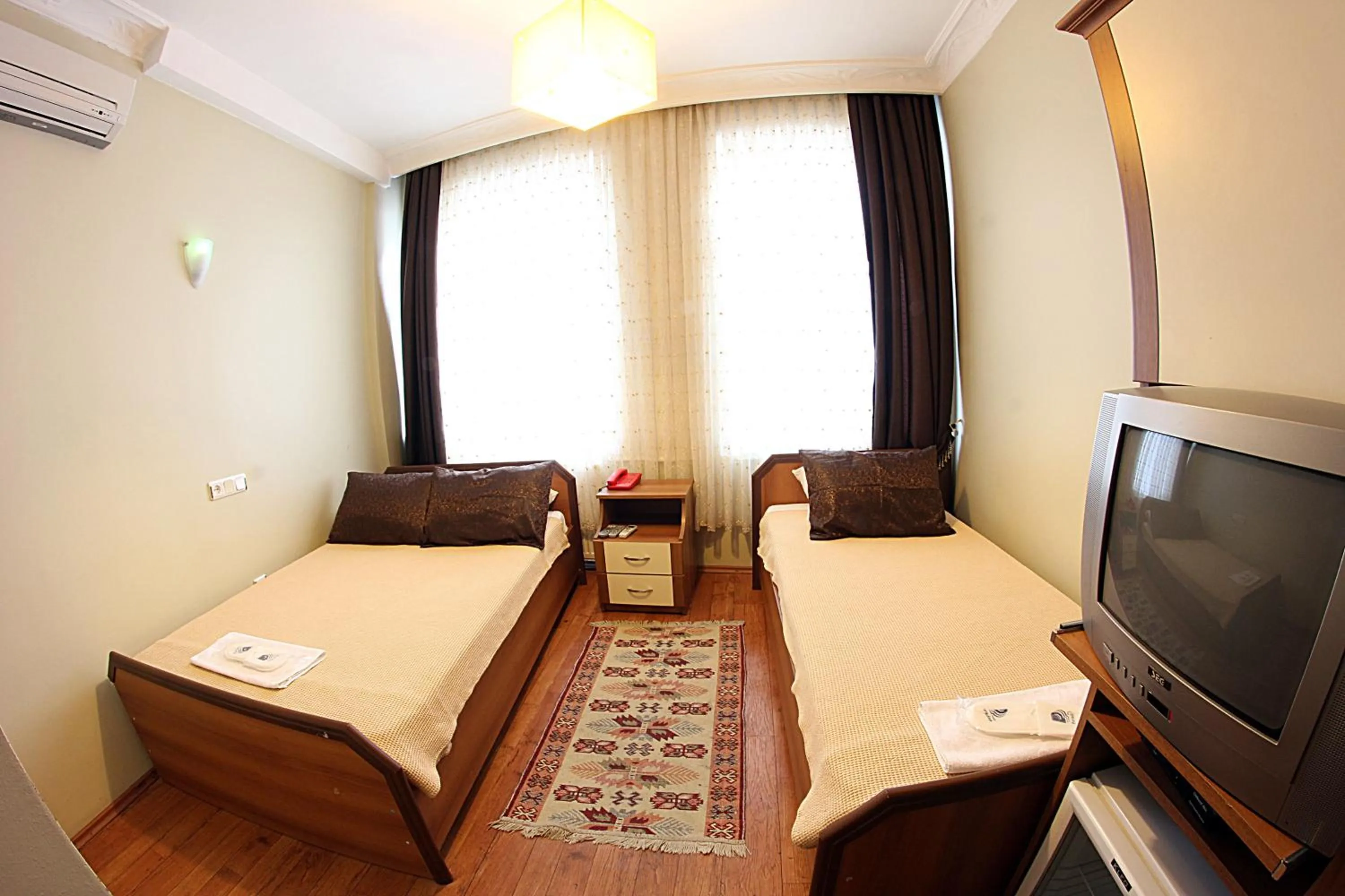 Photo of the whole room, Bed in Paradise Hotel