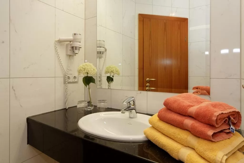 Bathroom in Landhotel Schneider