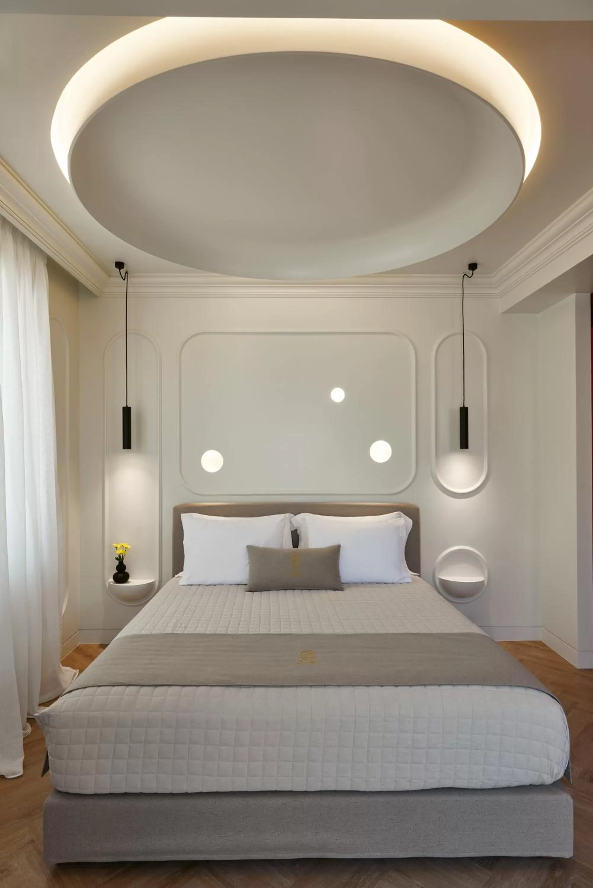 Bed in DWELL - Elegant City Stay