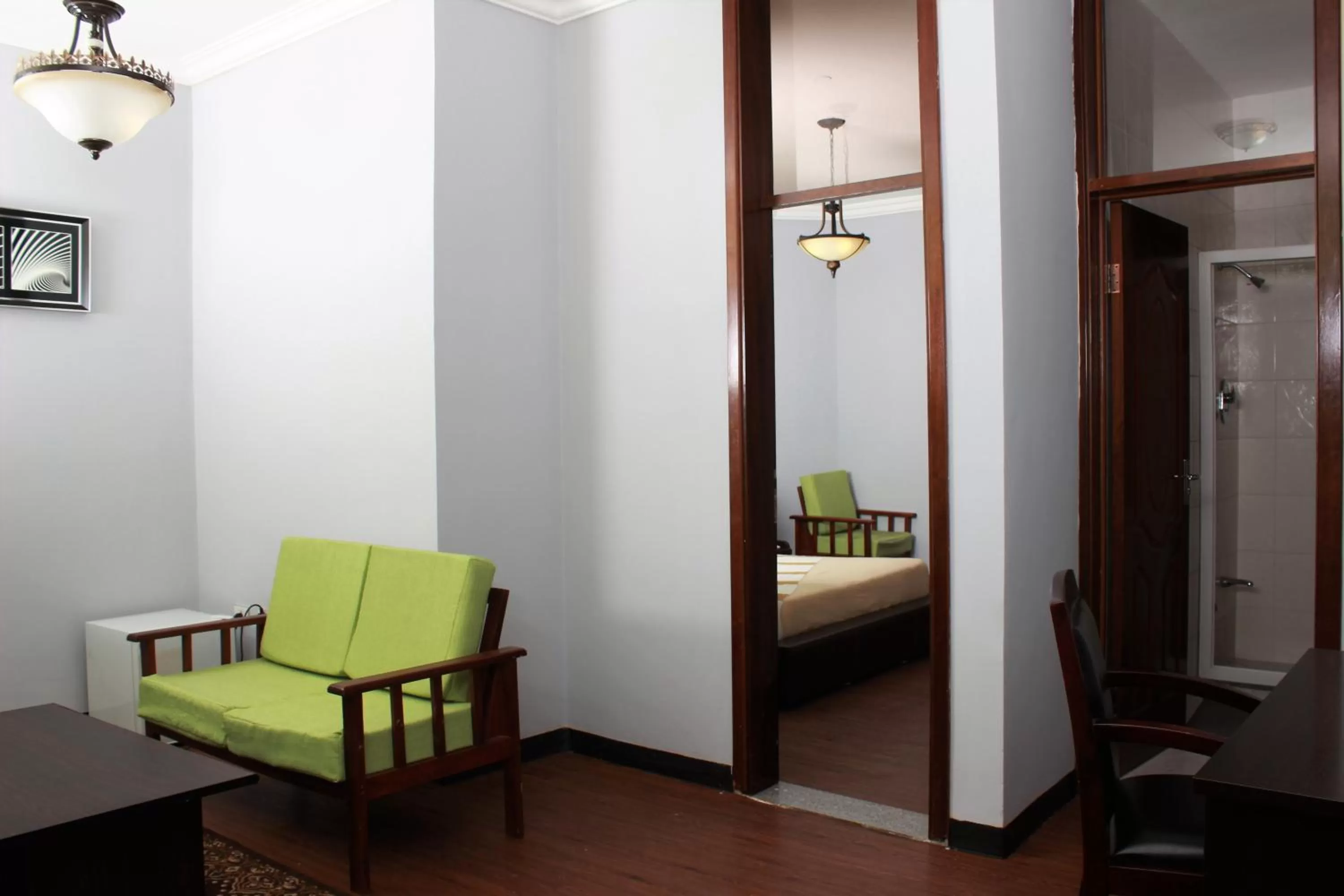 Living room, Bed in Hotel Lobelia