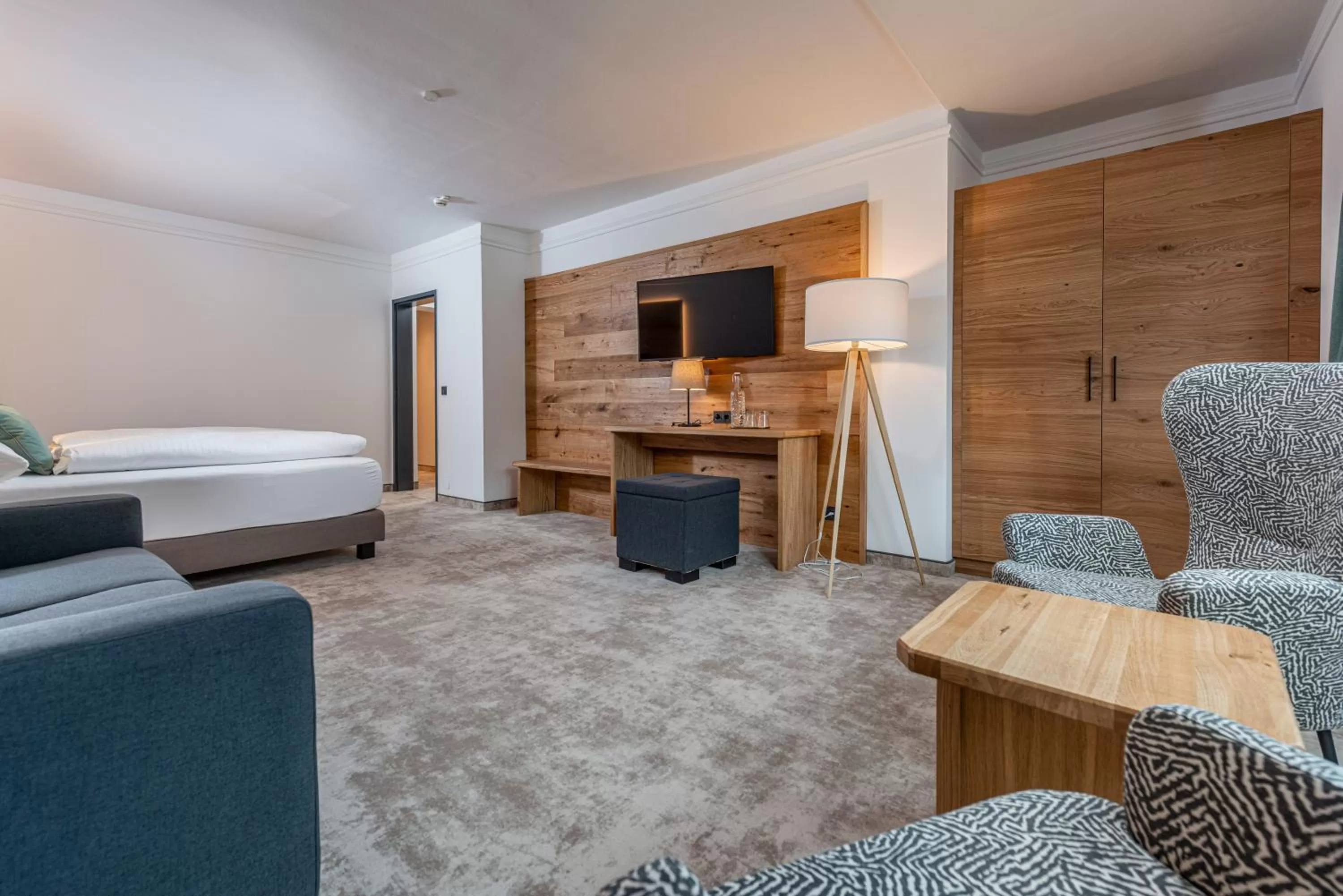 Seating area, Bed in Stadtvilla Schladming Boutiquehotel