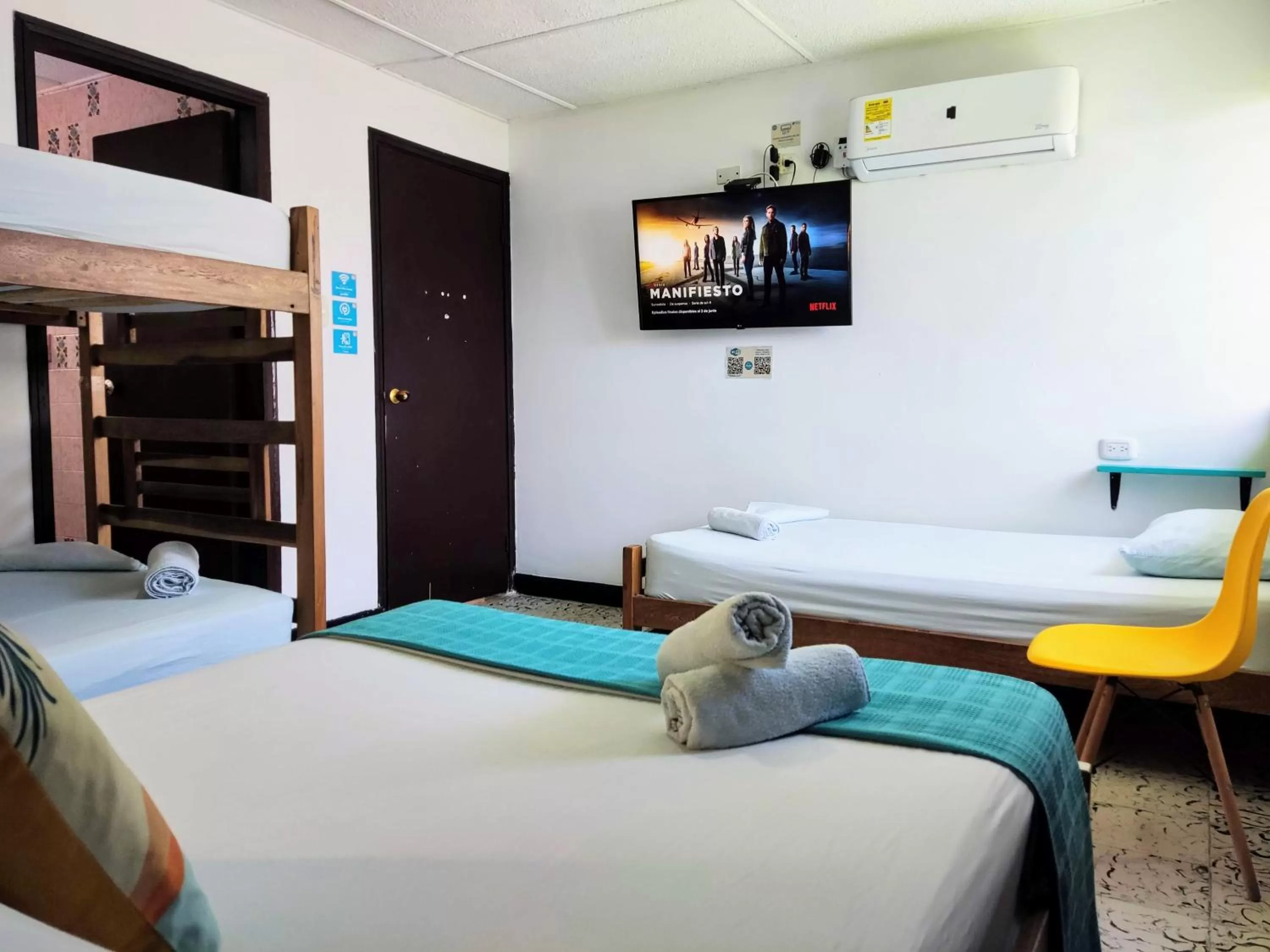 Bed in Bona Vida Hotel