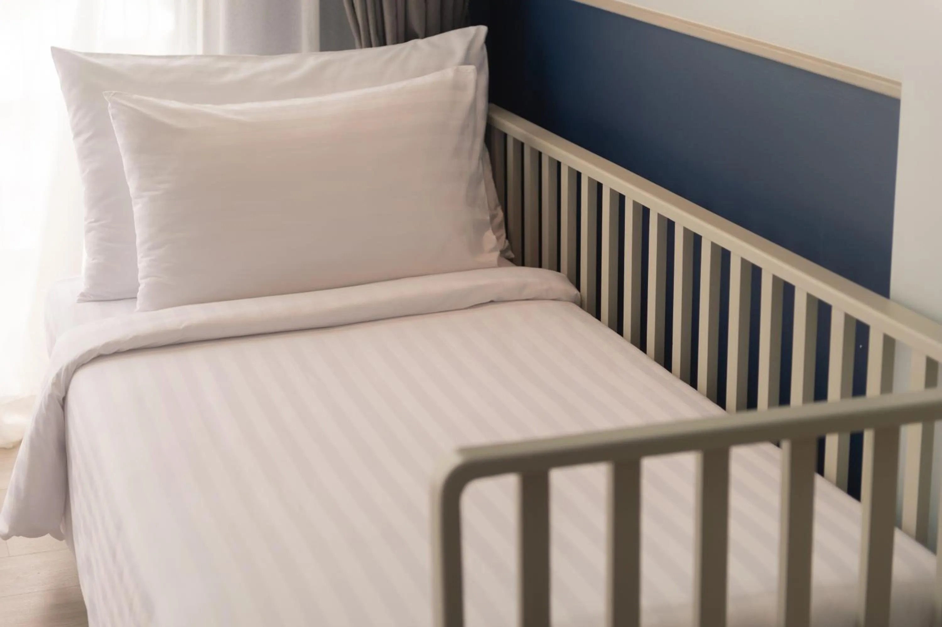 Bed in Seabed Grand Hotel Phuket - SHA Extra Plus