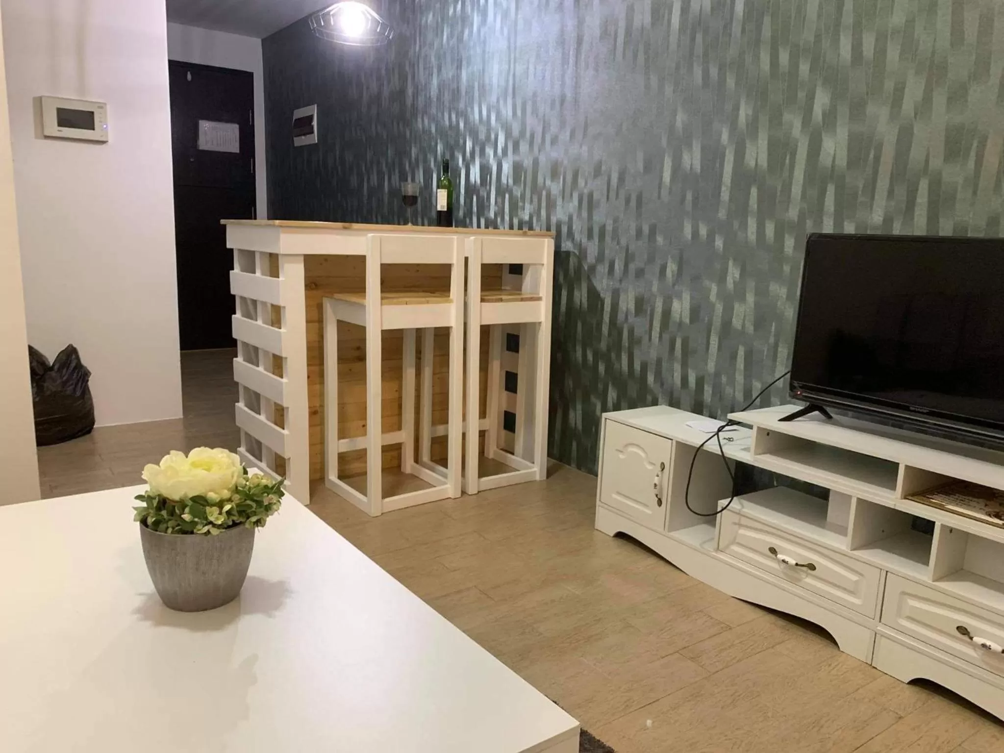 Communal lounge/ TV room in 81 Newport Boulevard Cluster 4 - 8F across NAIA Airport, Terminal 3