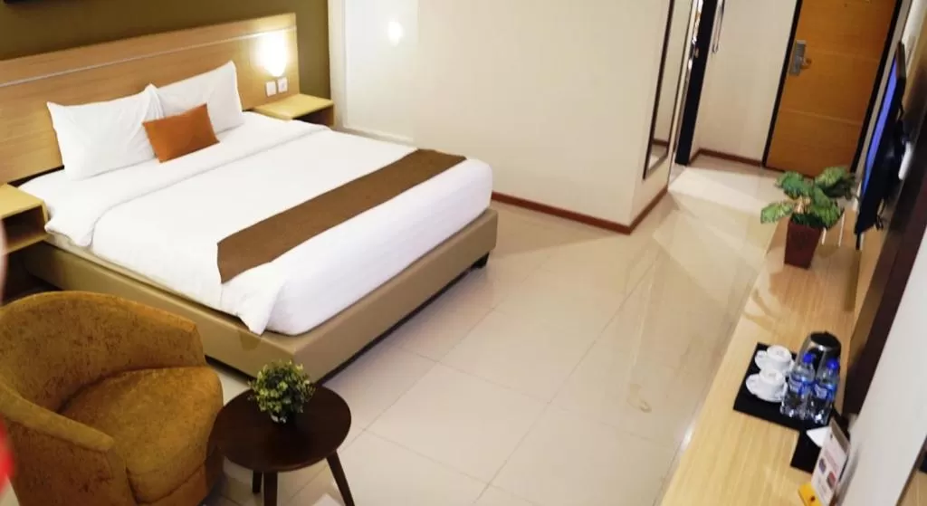 Bed in De Laxston Hotel Yogyakarta, Azana Hotels Collection