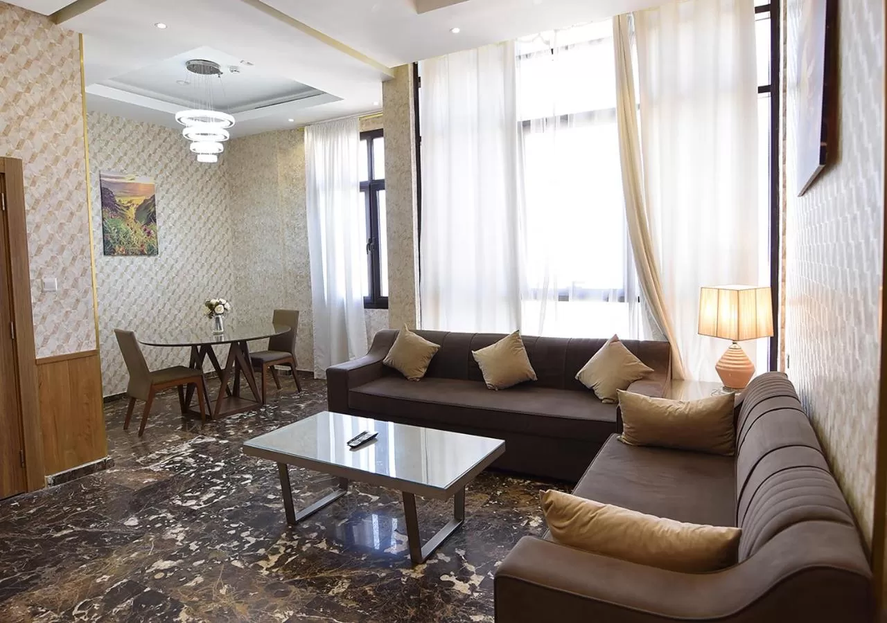 Communal lounge/ TV room, Seating Area in Rihanna Hotel Apartment