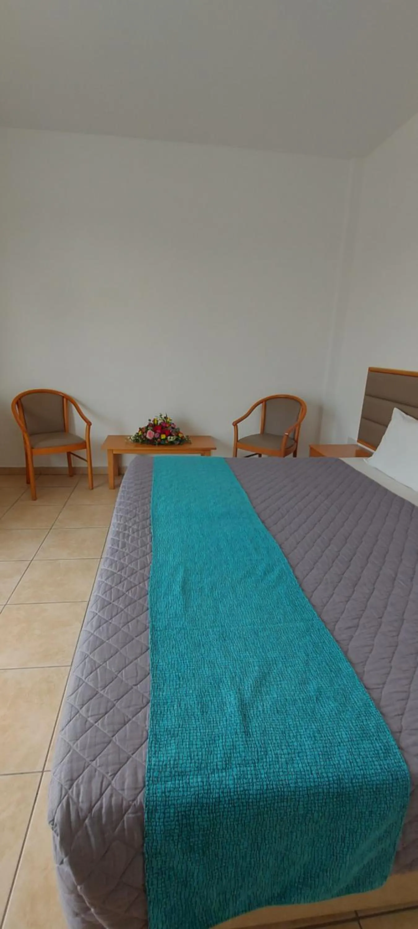 Bed in New Famagusta Hotel & Suites