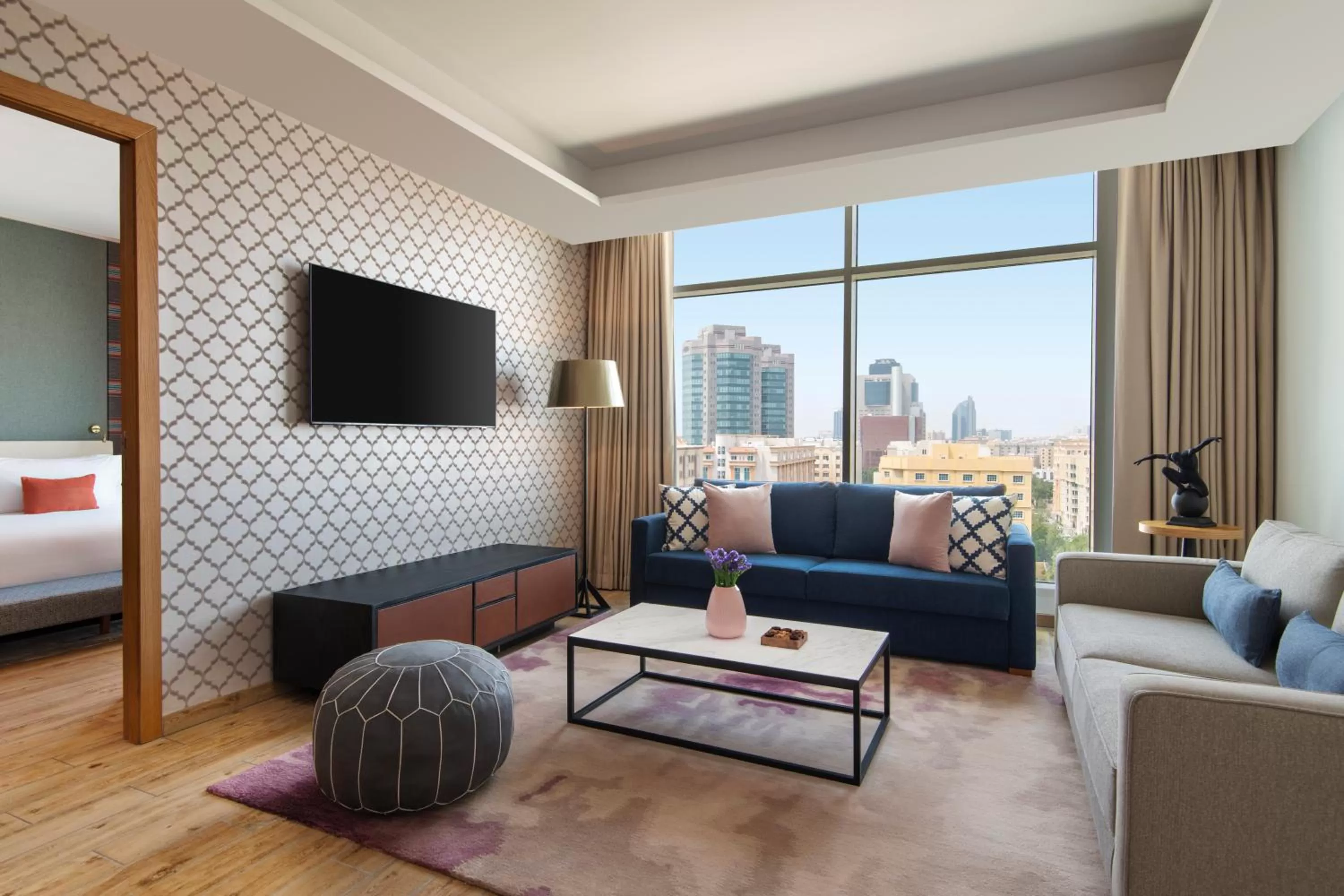 Communal lounge/ TV room in Abesq Doha Hotel and Residences, an IHG Hotel