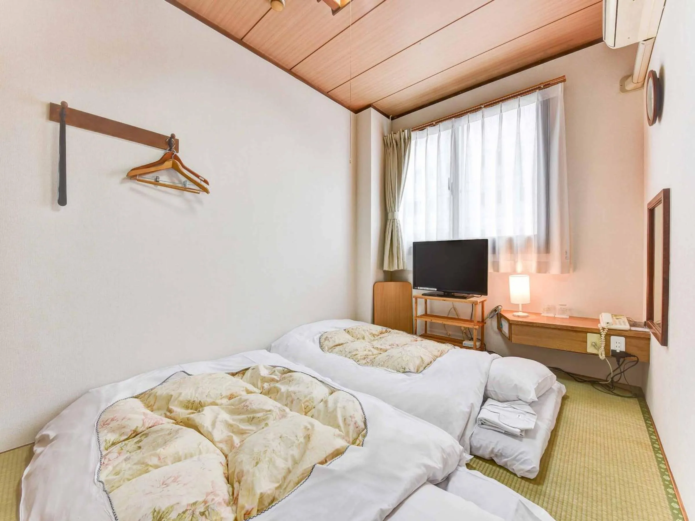 Photo of the whole room, Bed in Hotel Crane Tachibana