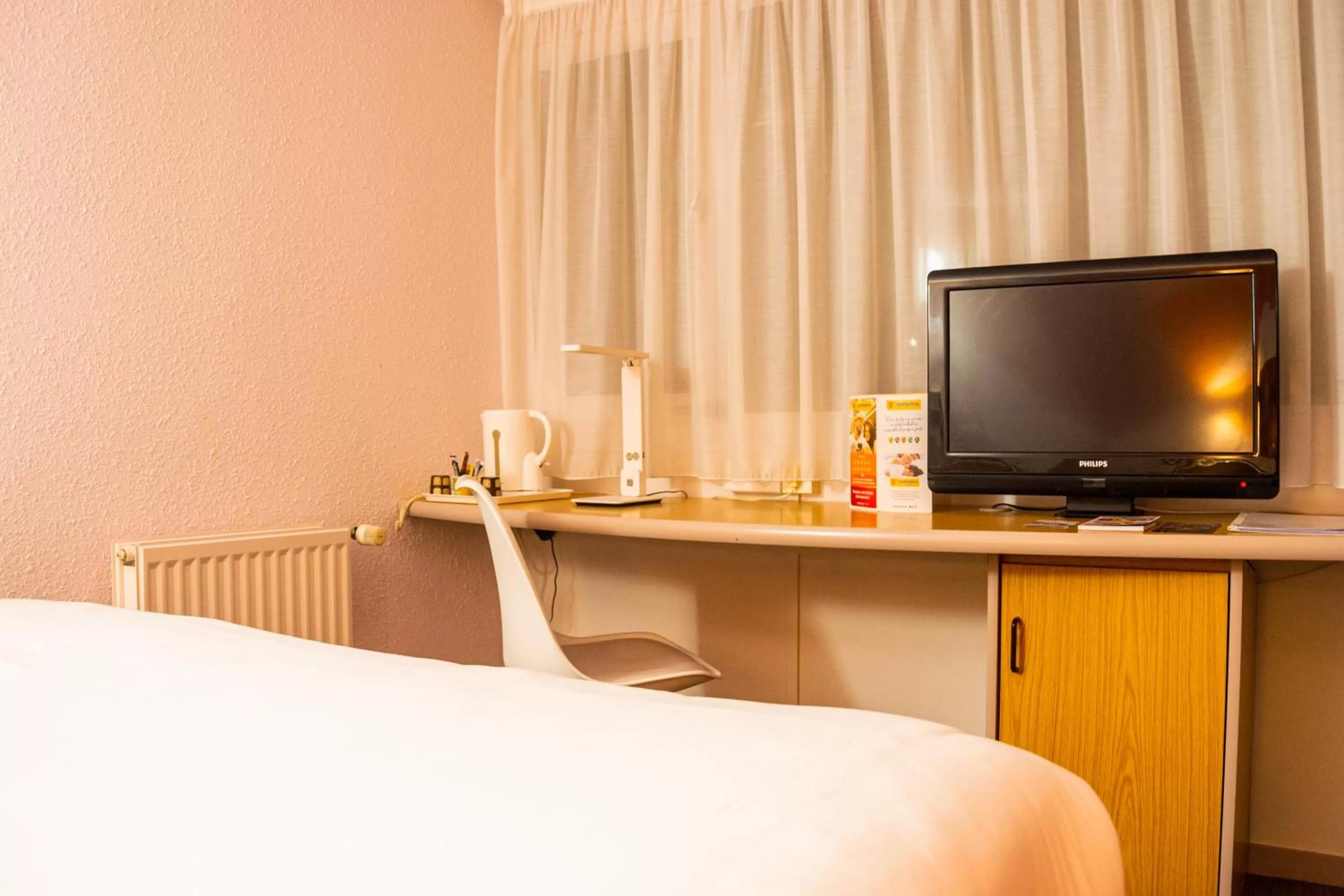 Bed in initial by balladins La Roche-sur-Yon