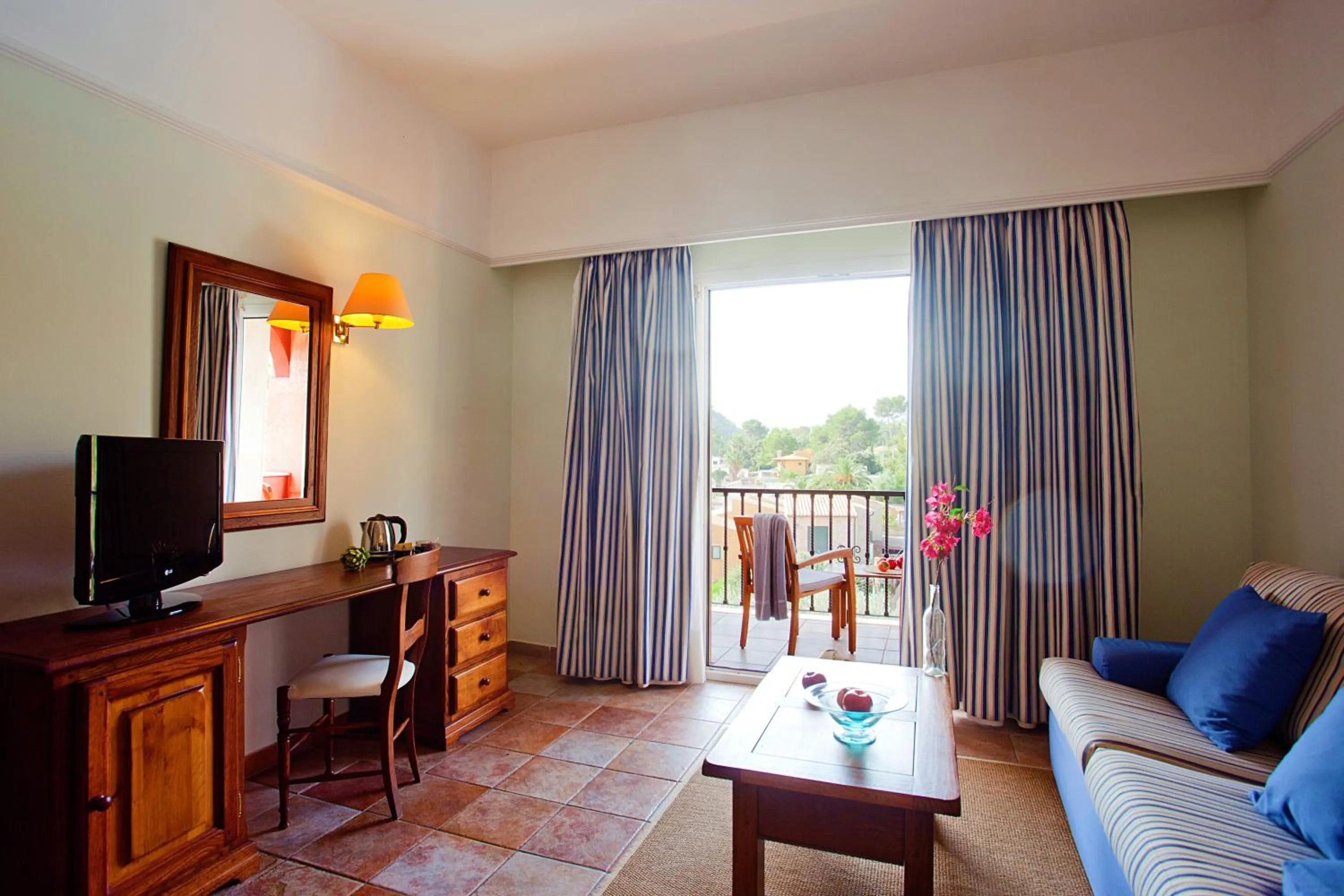 Photo of the whole room in Hotel Cala Sant Vicenç - Adults Only