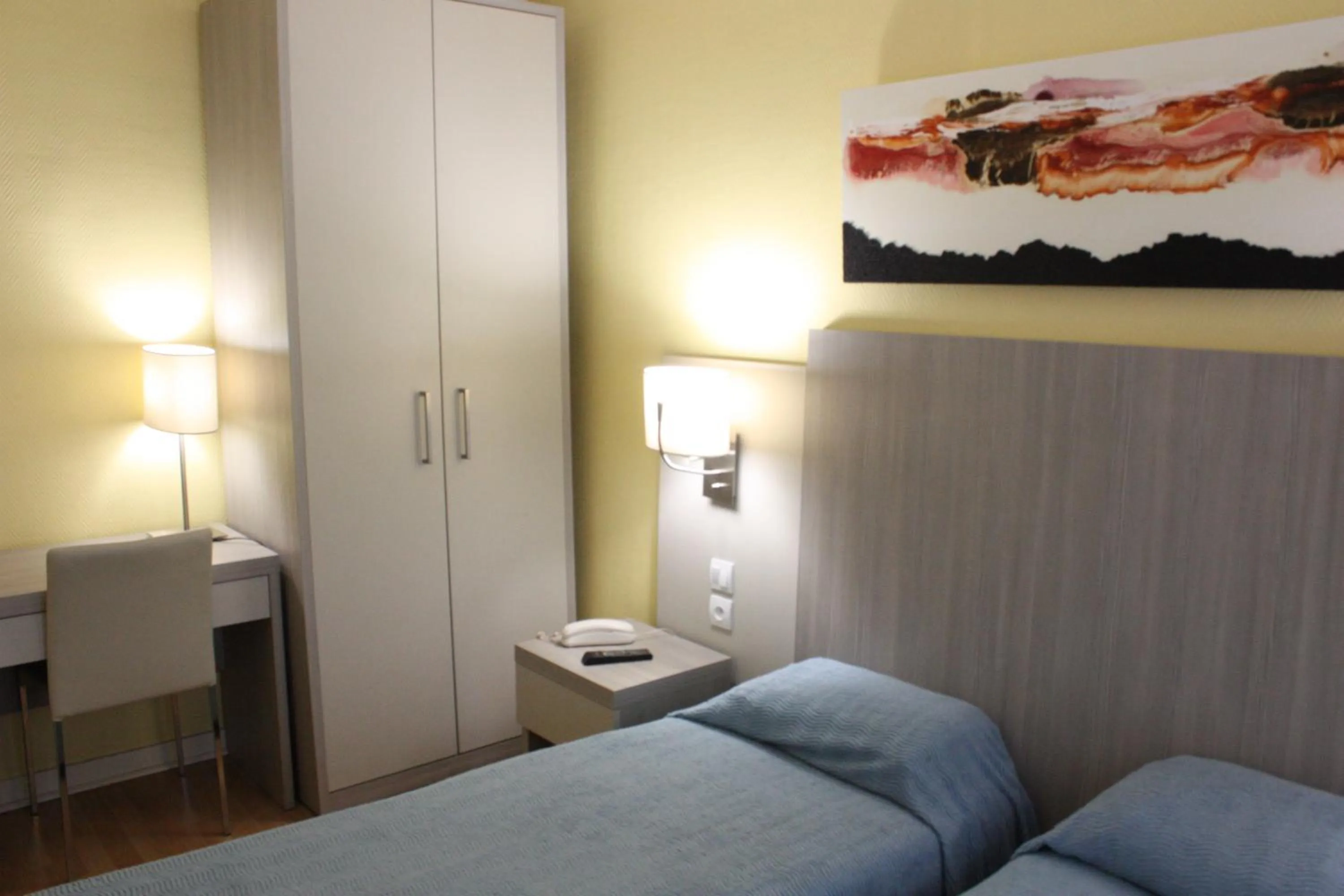 Bed in Hotel Excelsior