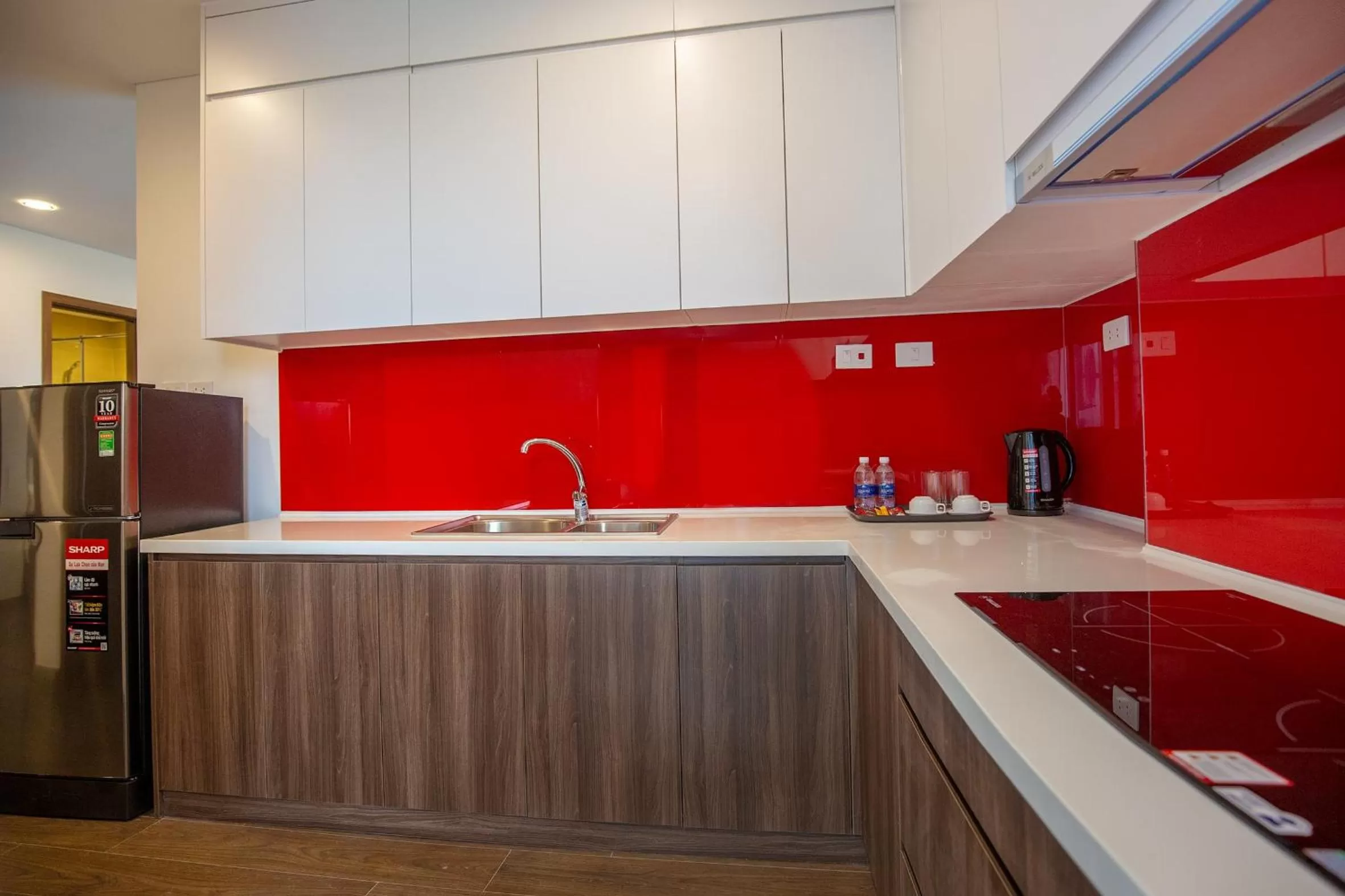 Communal kitchen in Ramada Hotel & Suites by Wyndham Halong Bay View