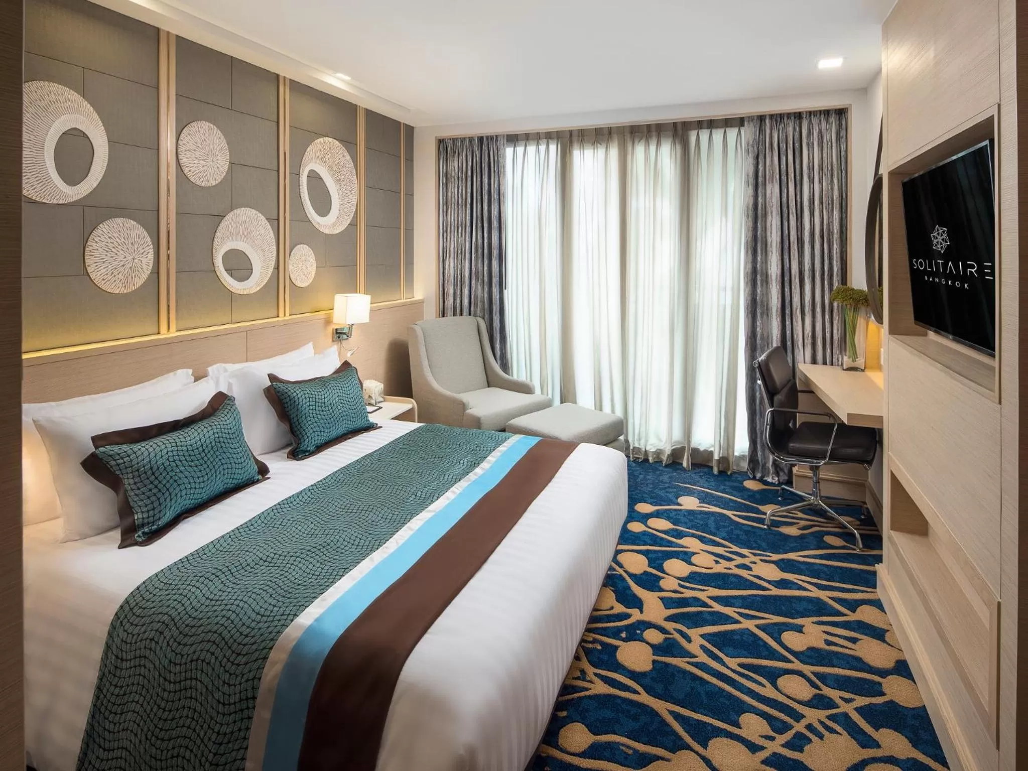 Bed in Solitaire Bangkok Sukhumvit 11